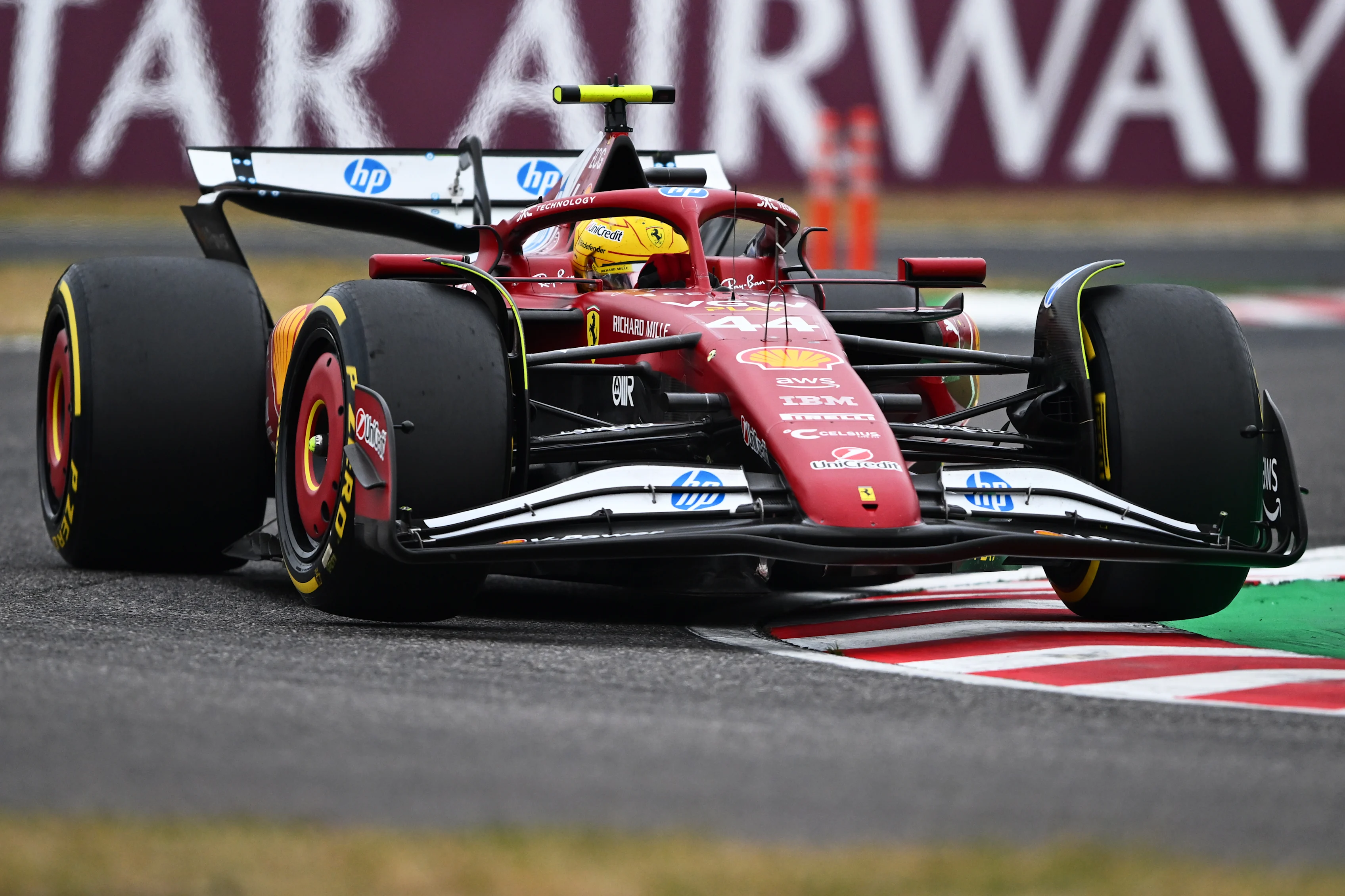 SUZUKA, JAPAN - APRIL 06: Lewis Hamilton of Great Britain driving the (44) Scuderia Ferrari SF-25