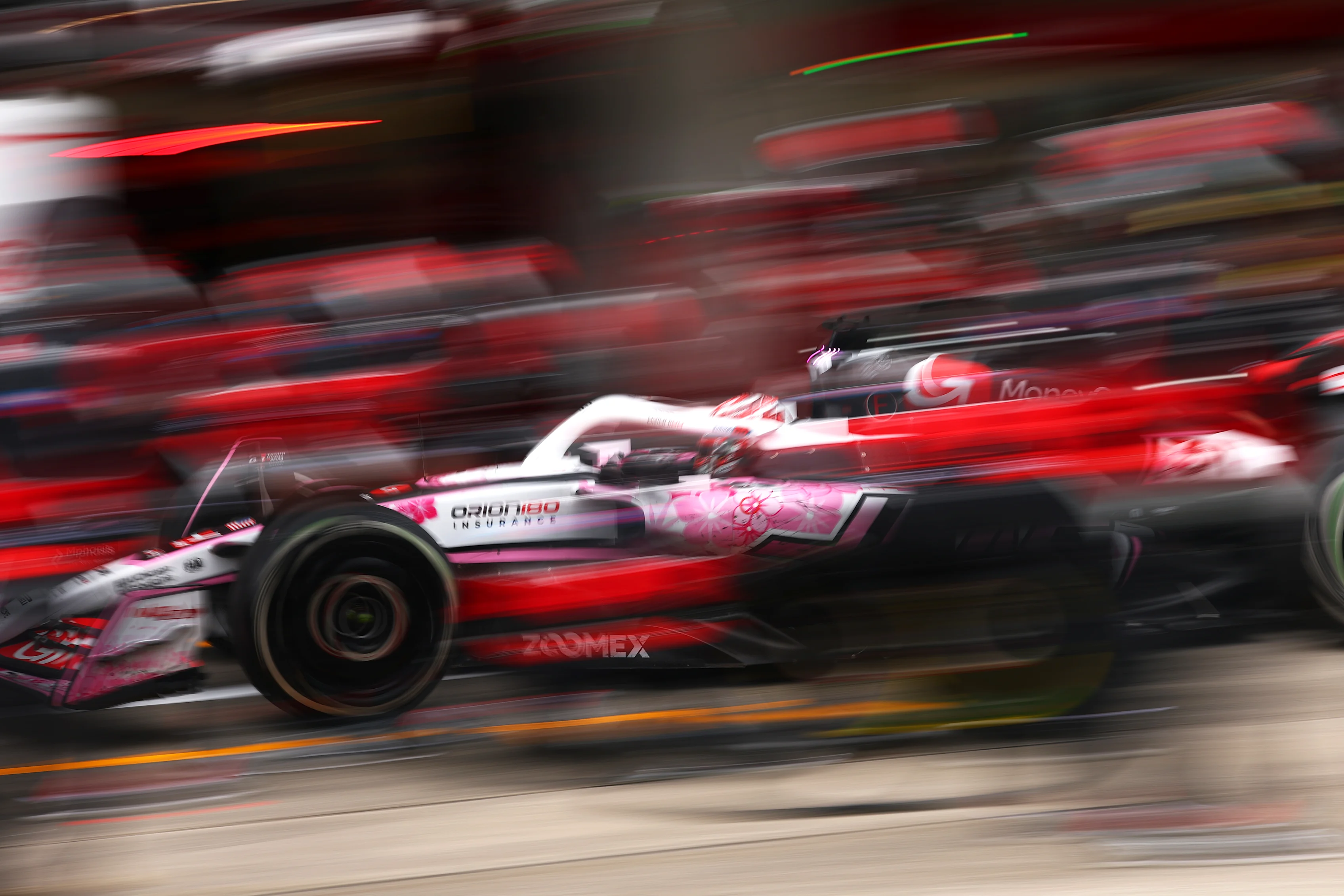 SUZUKA, JAPAN - APRIL 06: Esteban Ocon of France driving the (31) Haas F1 VF-25 Ferrari in the Pitlane  during the F1 Grand Prix of Japan at Suzuka Circuit on April 06, 2025 in Suzuka, Japan. (Photo by Bryn Lennon - Formula 1/Formula 1 via Getty Images)
