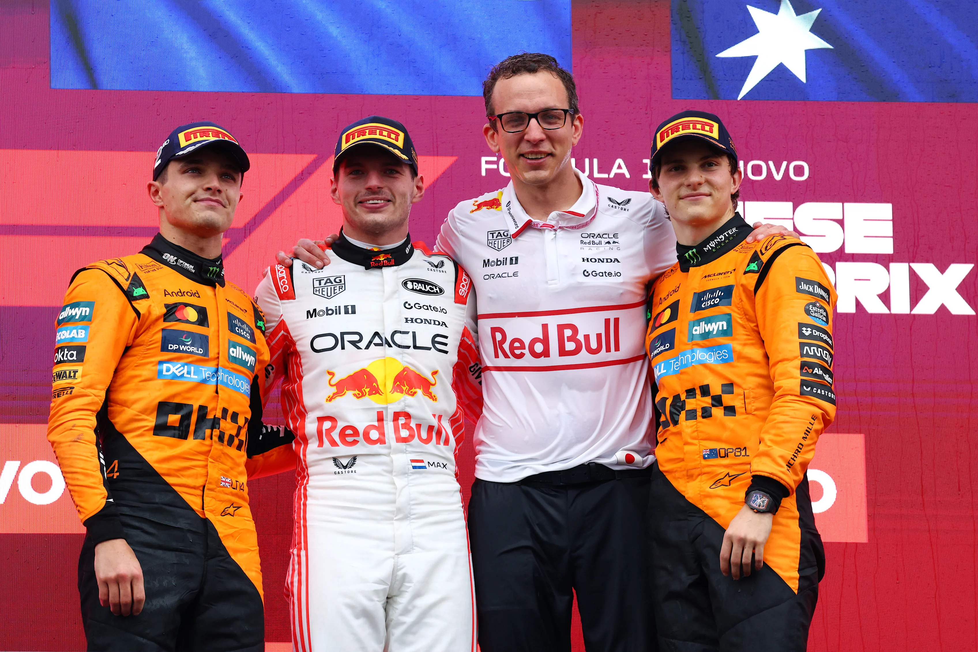 Lando Norris, Max Verstappen, Hugh Bird and Oscar Piastri  on the podium during the F1 Grand Prix of Japan at Suzuka Circuit on April 06, 2025 in Suzuka, Japan. (Photo by Clive Rose/Getty Images)