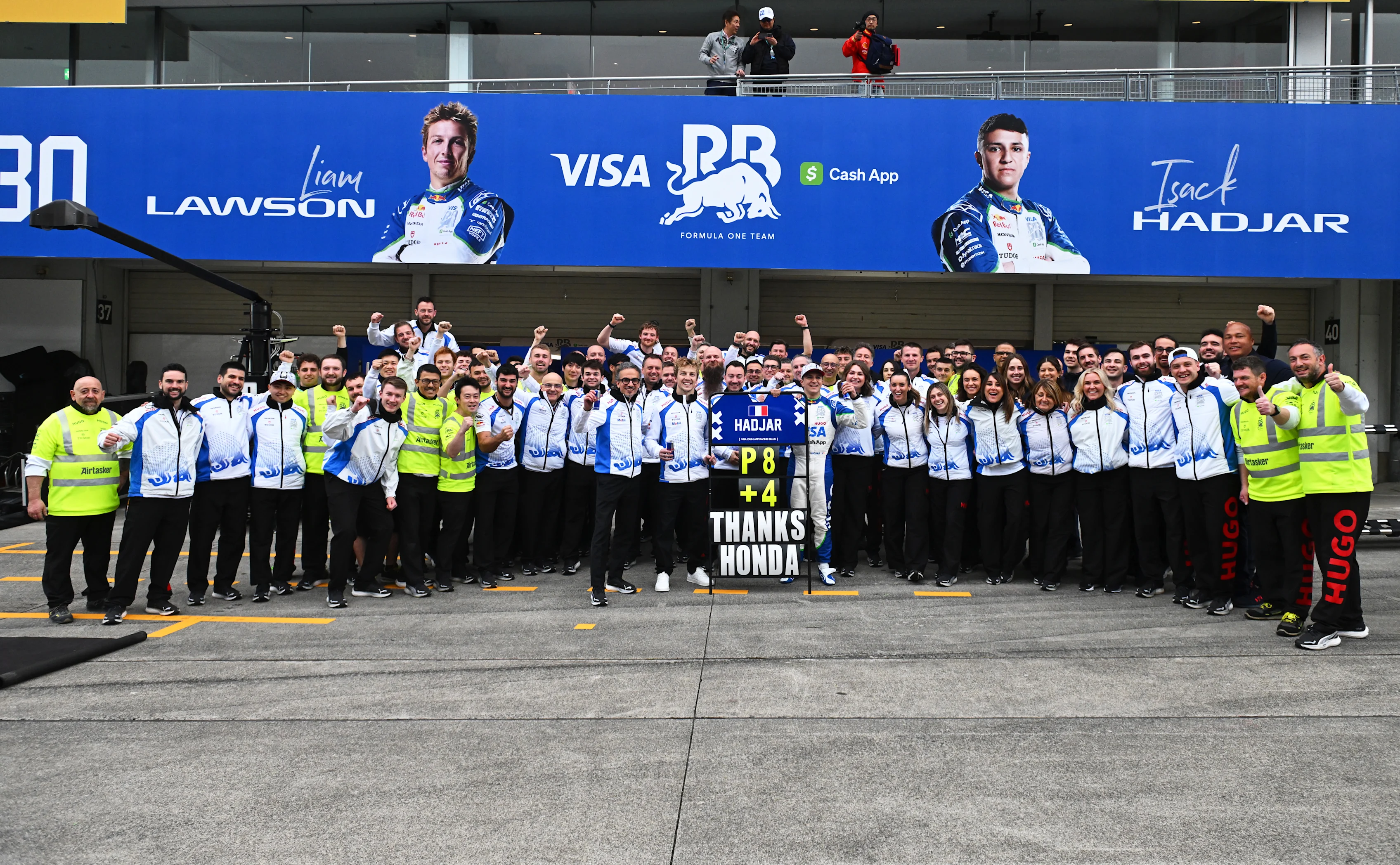 Laurent Mekies, Liam Lawson, Isack Hadjar and the Visa Cash App Racing Bulls team celebrate first points for Hadjar during the F1 Grand Prix of Japan at Suzuka Circuit on April 06, 2025 in Suzuka, Japan. (Photo by Rudy Carezzevoli/Getty Images)
