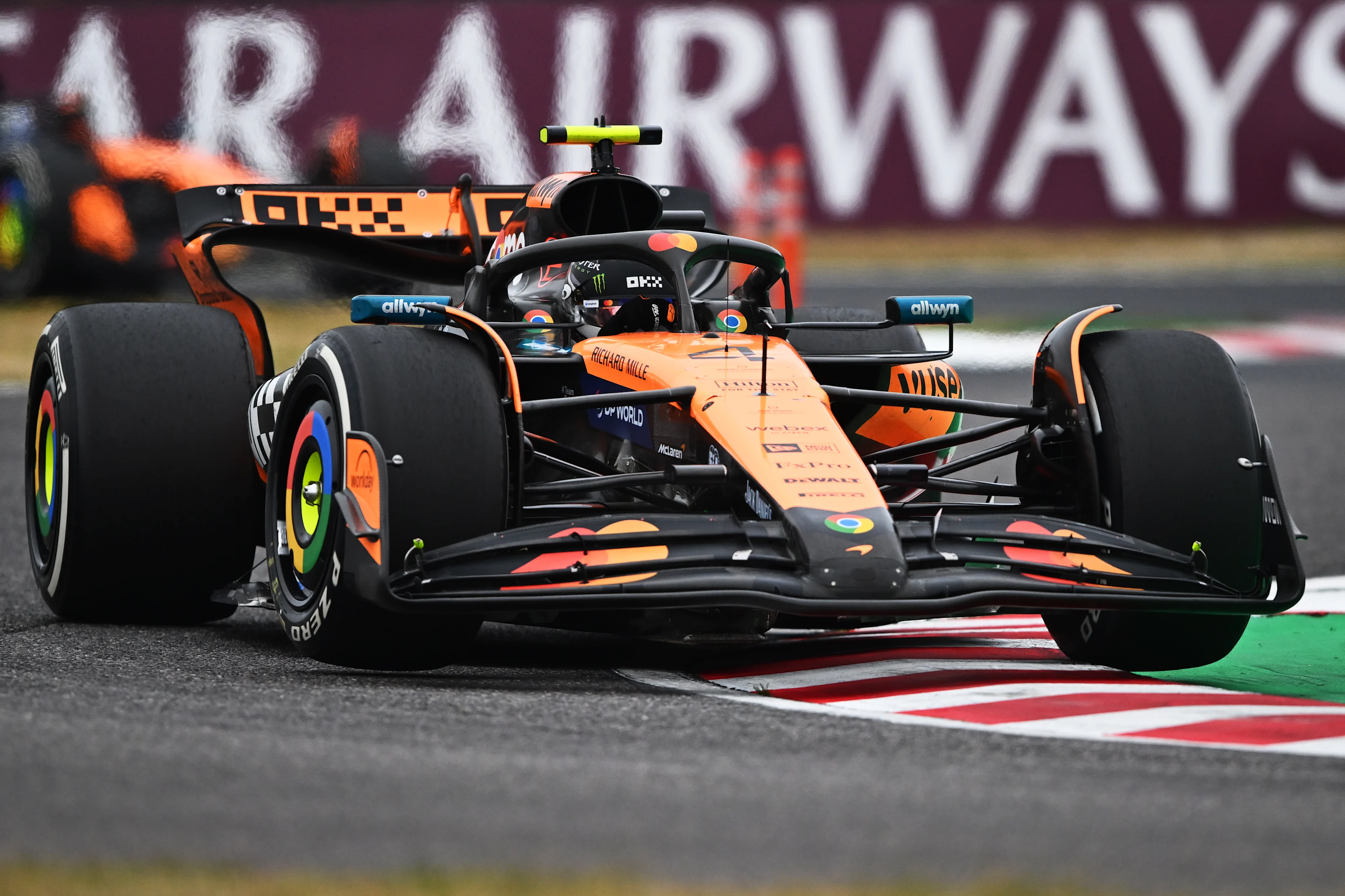 SUZUKA, JAPAN - APRIL 06: Lando Norris of Great Britain driving the (4) McLaren MCL39 Mercedes on
