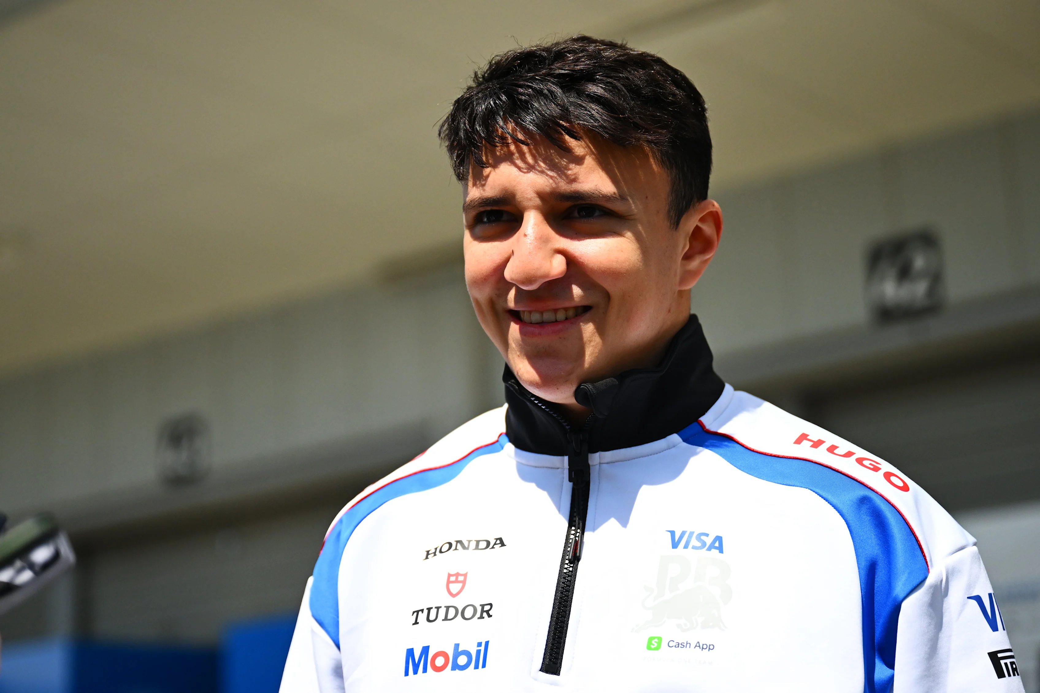 SUZUKA, JAPAN - APRIL 03: Isack Hadjar of France and Visa Cash App Racing Bulls looks on  during