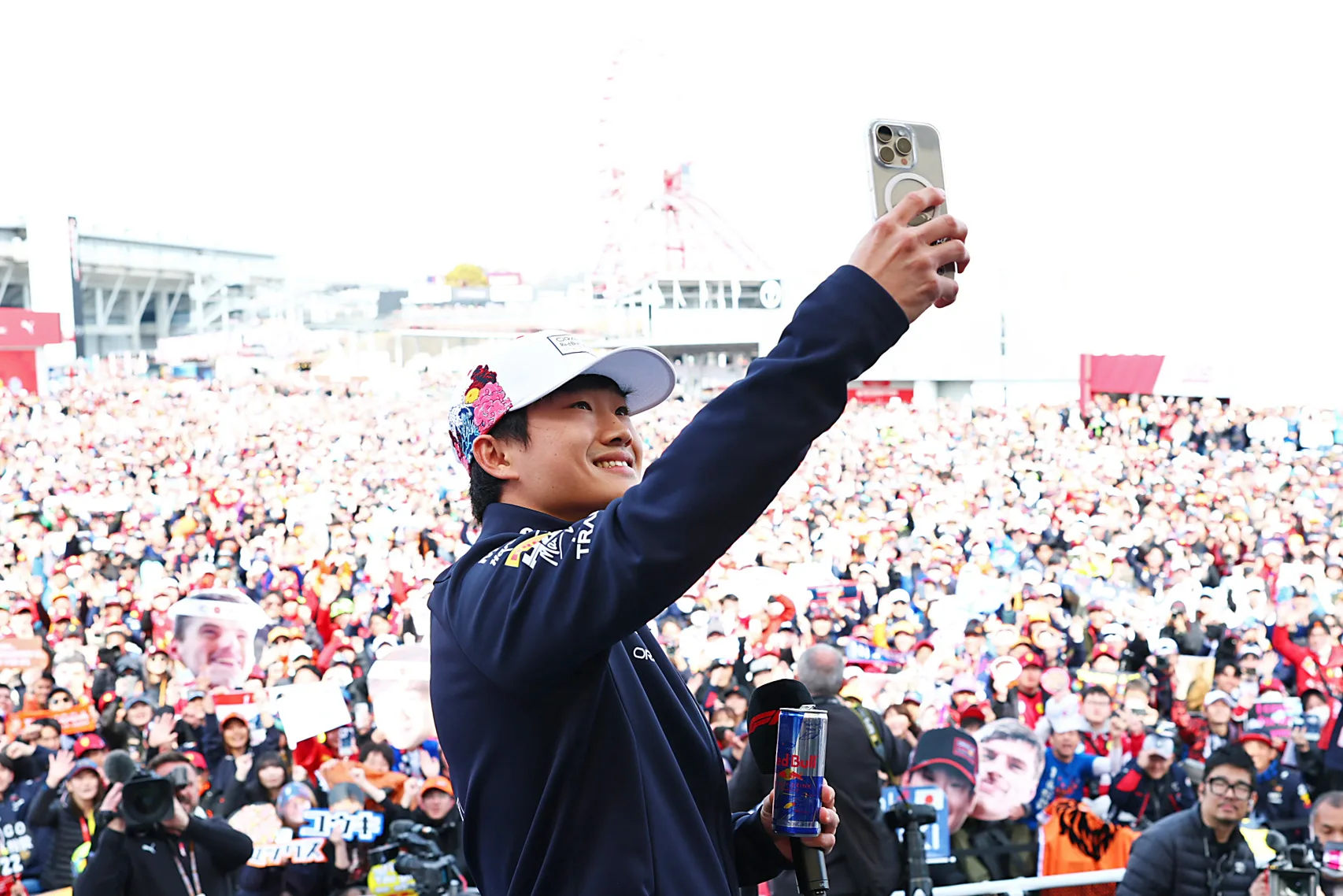 SUZUKA, JAPAN - APRIL 05: Yuki Tsunoda of Japan and Oracle Red Bull Racing takes a selfie with the