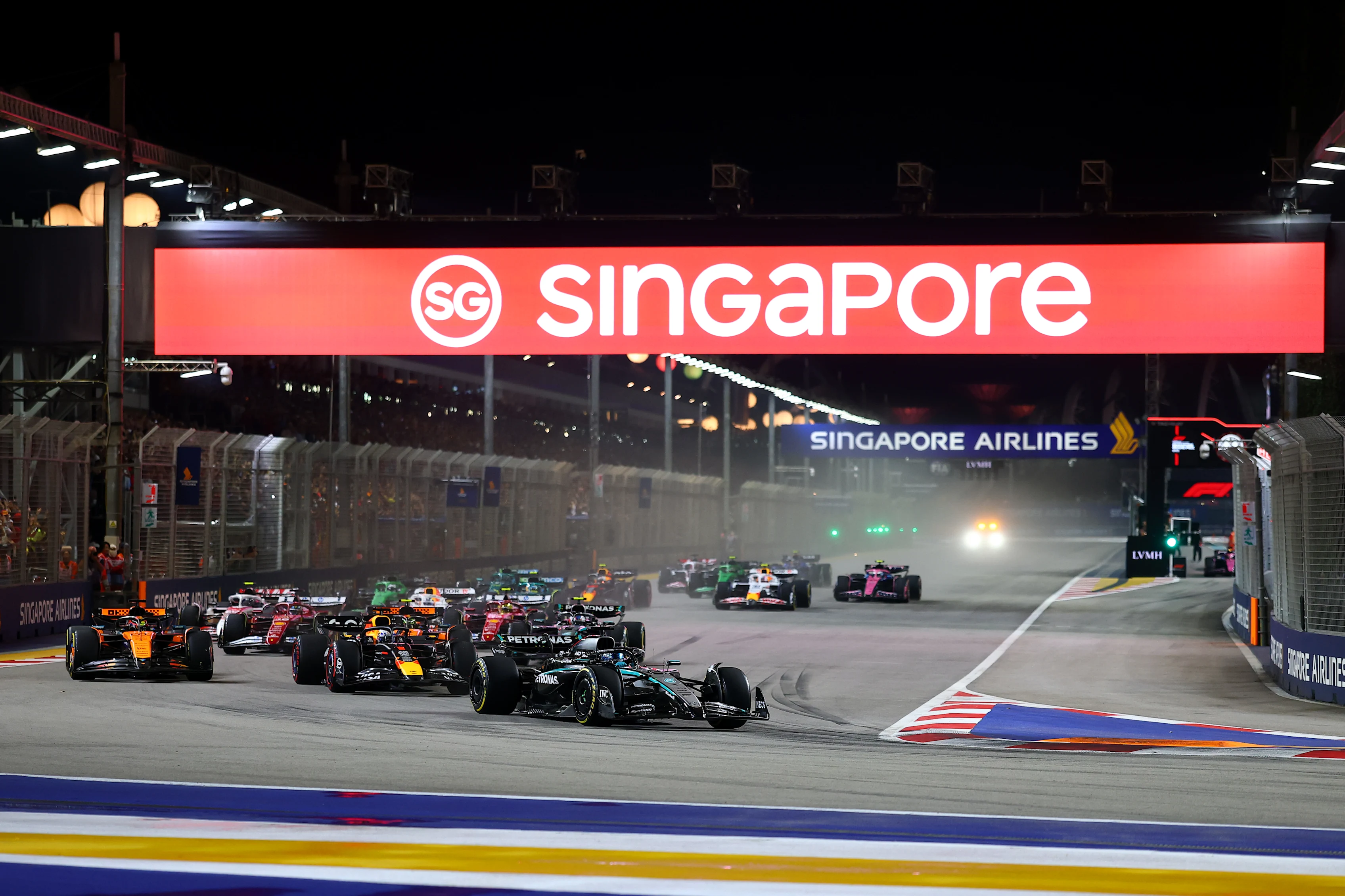 SINGAPORE, SINGAPORE - OCTOBER 05: George Russell of Great Britain driving the (63) Mercedes AMG