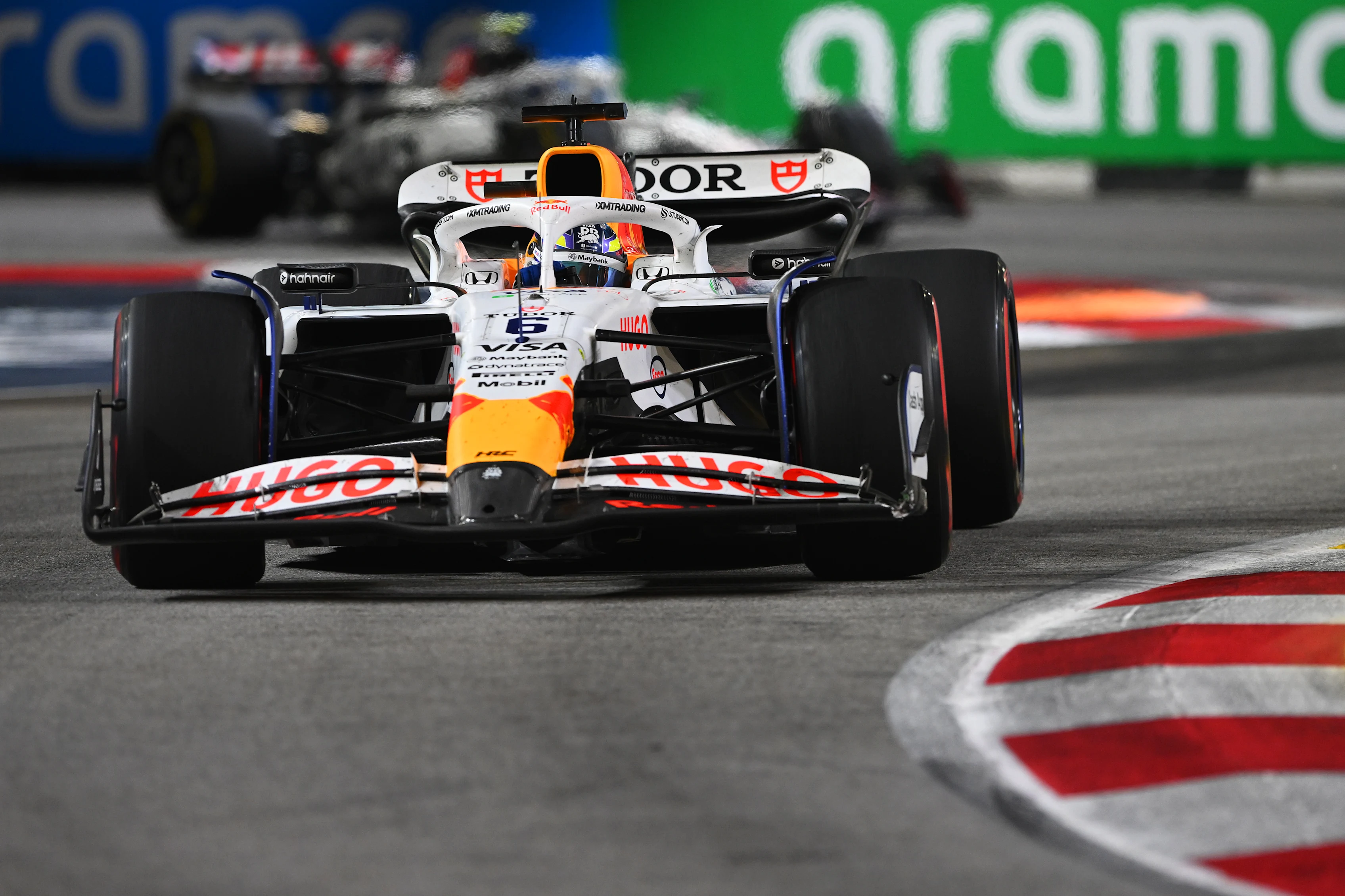 SINGAPORE, SINGAPORE - OCTOBER 05: Isack Hadjar of France driving the (6) Visa Cash App Racing