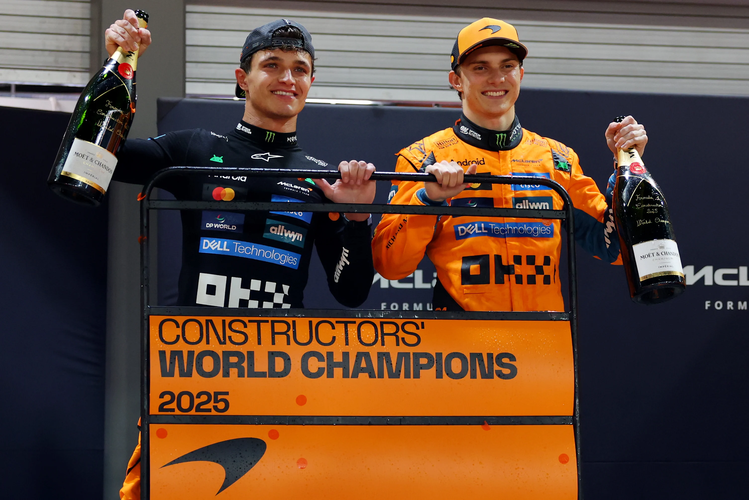 SINGAPORE, SINGAPORE - OCTOBER 05: Lando Norris of Great Britain and McLaren Oscar Piastri of
