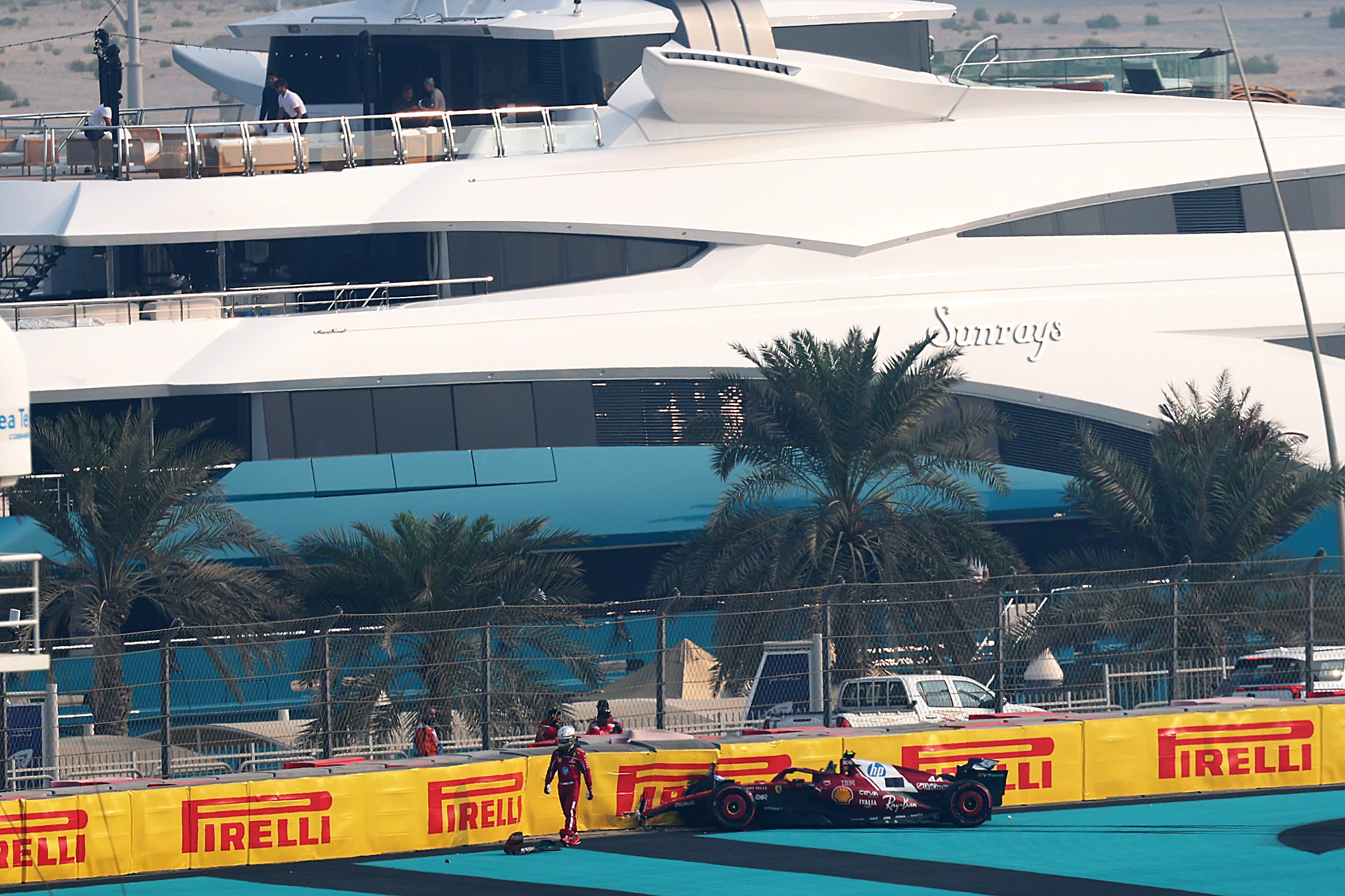 ABU DHABI, UNITED ARAB EMIRATES - DECEMBER 06: Lewis Hamilton of Great Britain and Scuderia Ferrari