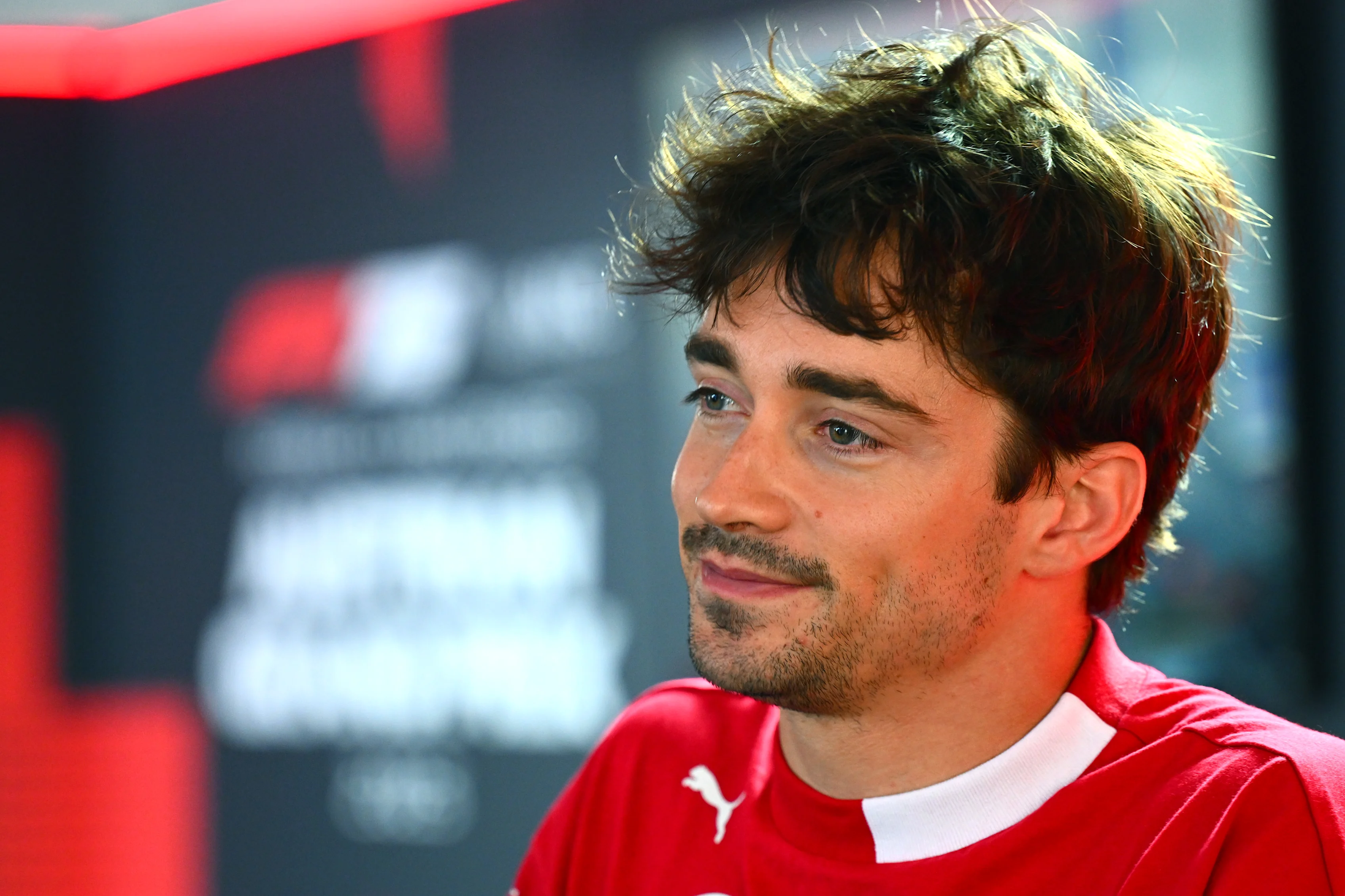 SPIELBERG, AUSTRIA - JUNE 26: Charles Leclerc of Monaco and Scuderia Ferrari is interviewed during