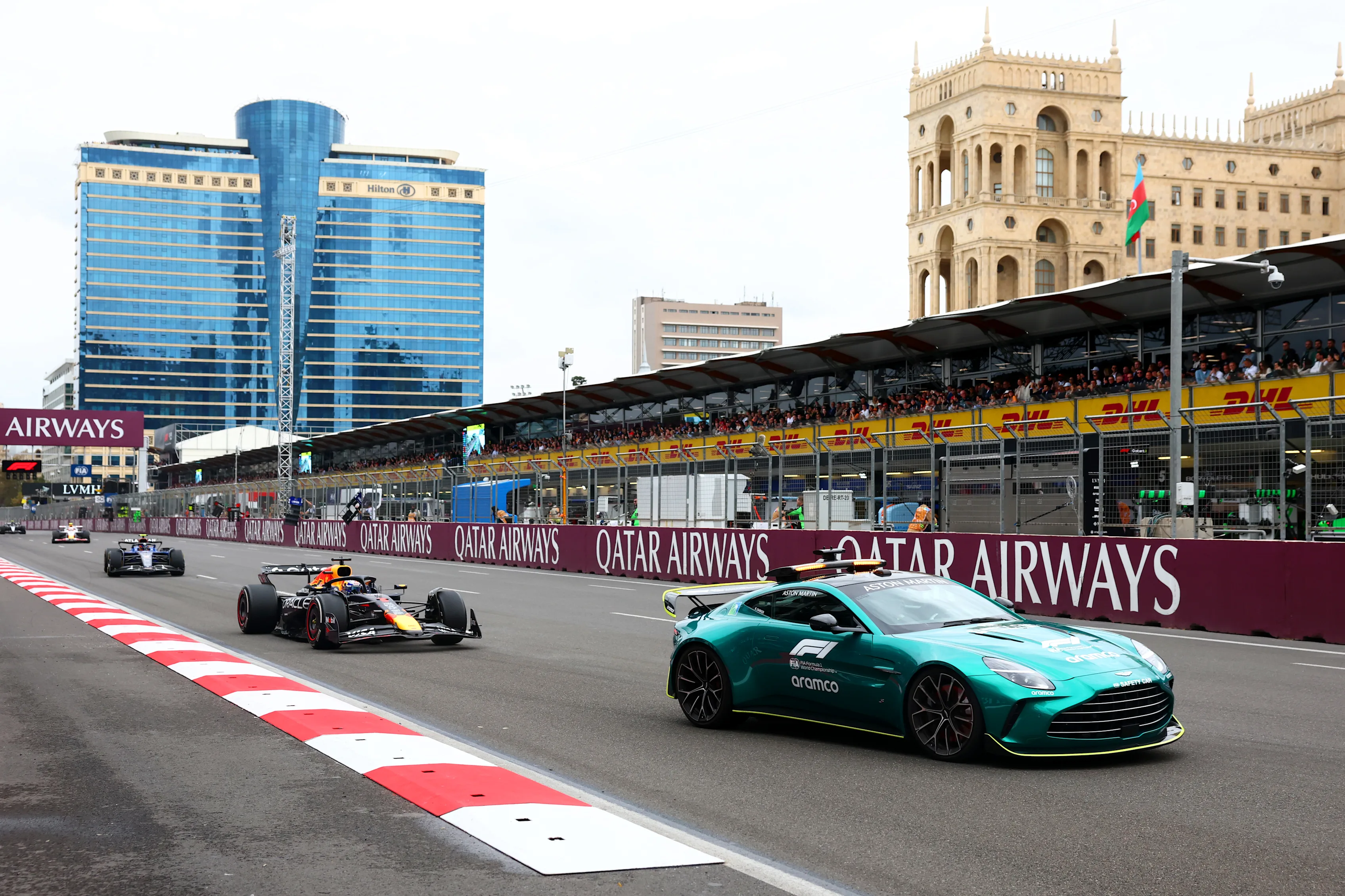 BAKU, AZERBAIJAN - SEPTEMBER 21: The FIA Safety Car leads Max Verstappen of the Netherlands driving