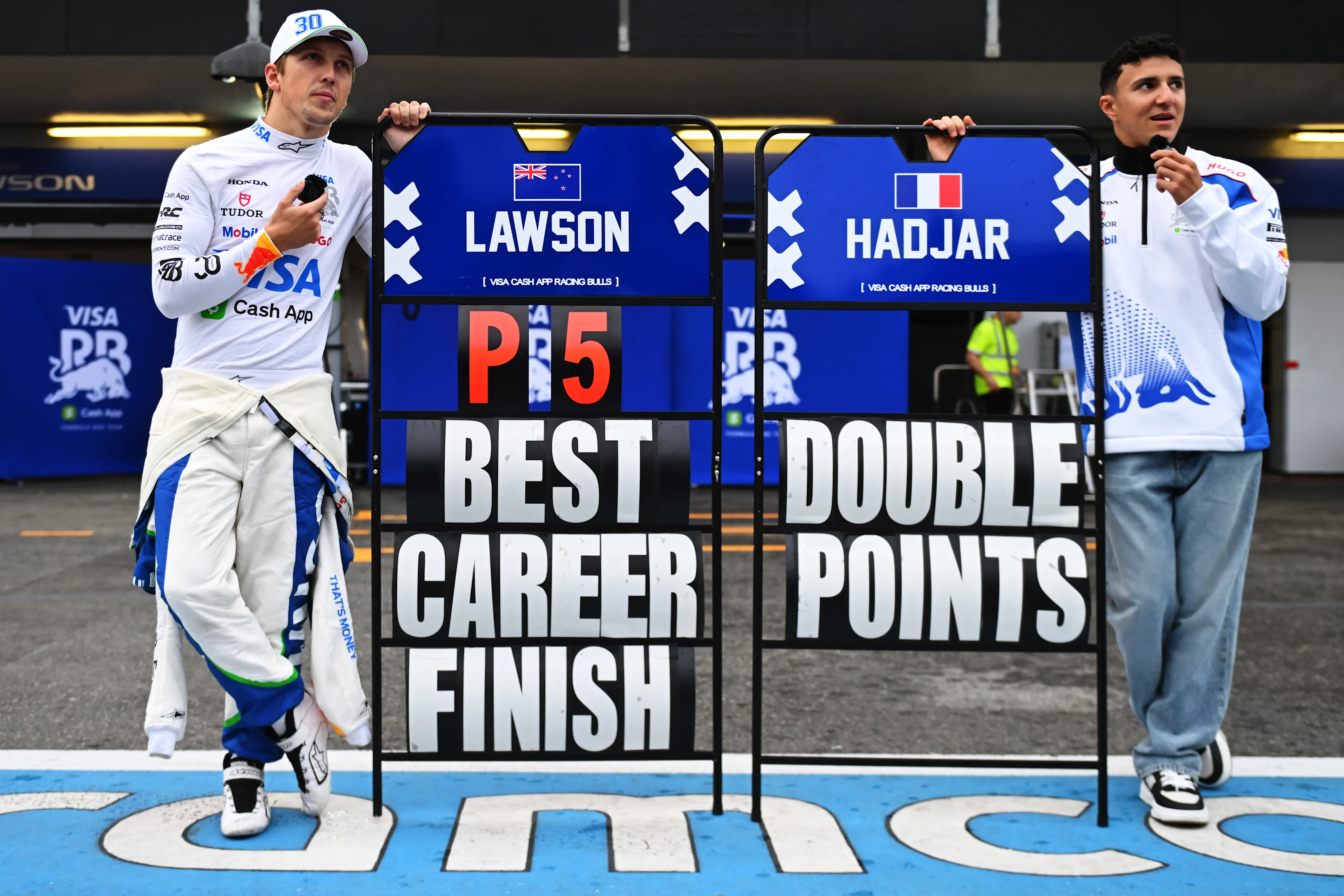 BAKU, AZERBAIJAN - SEPTEMBER 21: Fifth placed Liam Lawson of New Zealand and Visa Cash App Racing