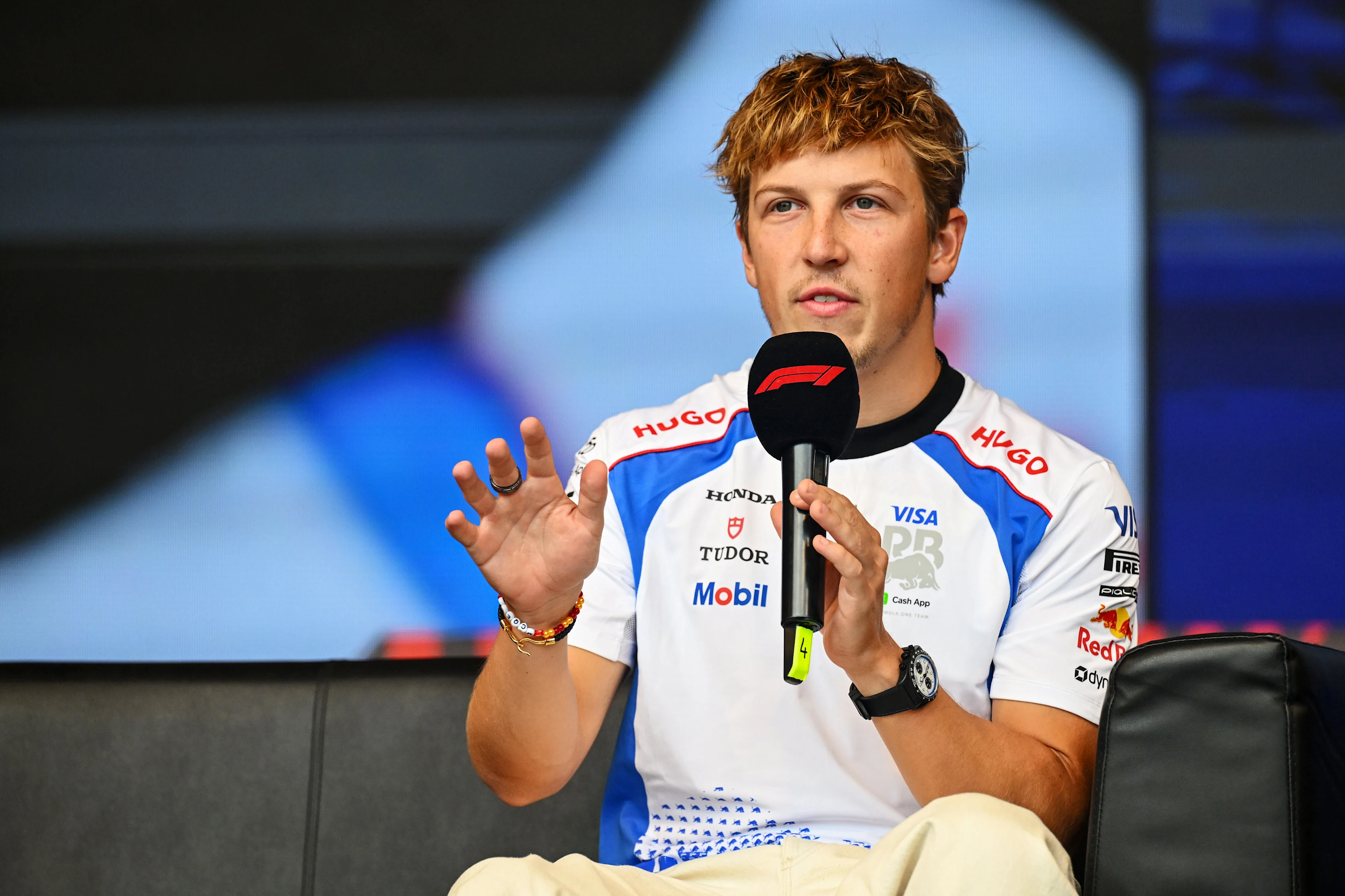 BAKU, AZERBAIJAN - SEPTEMBER 19: Liam Lawson of New Zealand and Visa Cash App Racing Bulls talks on