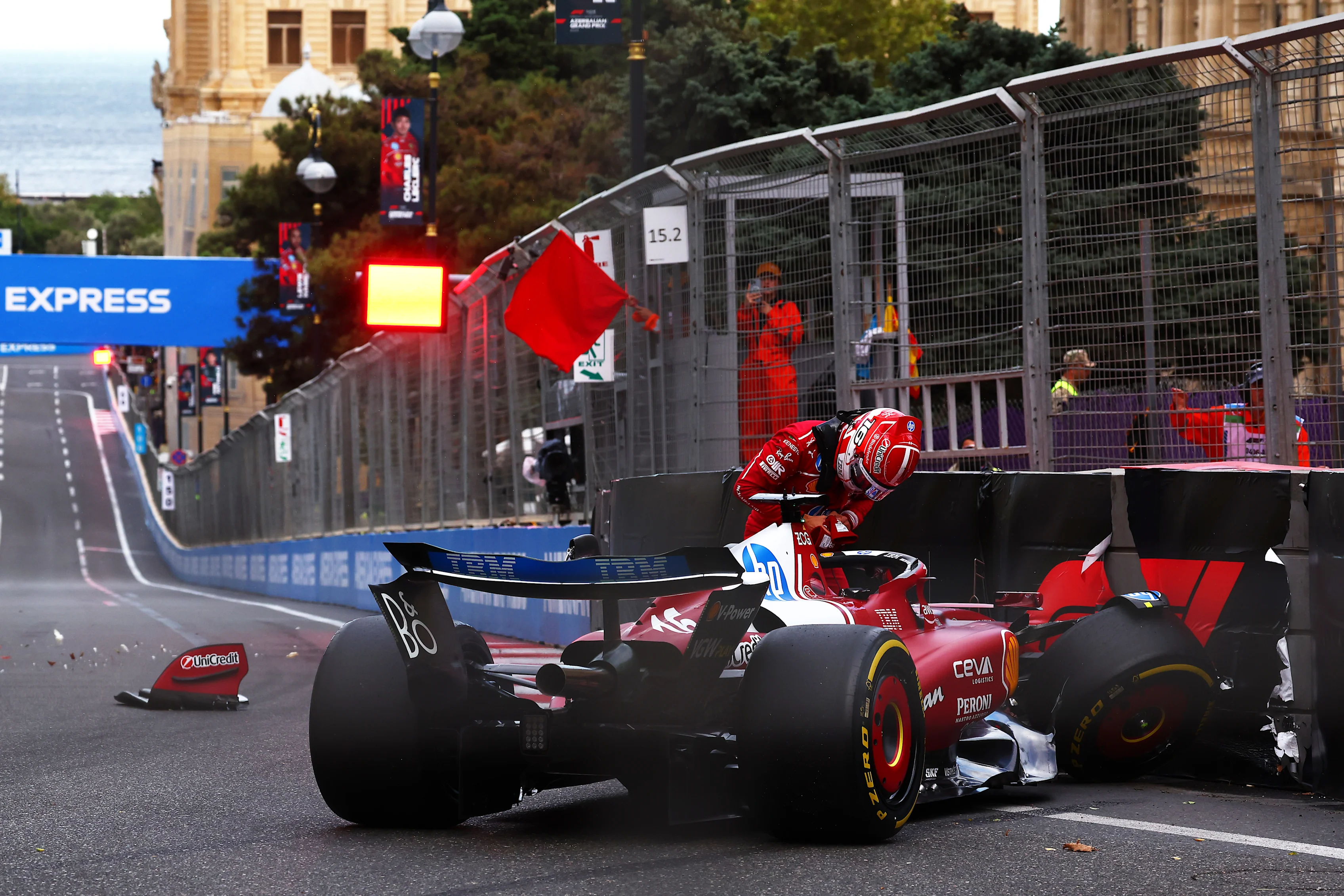 BAKU, AZERBAIJAN - SEPTEMBER 20: Charles Leclerc of Monaco and Scuderia Ferrari climbs out of his