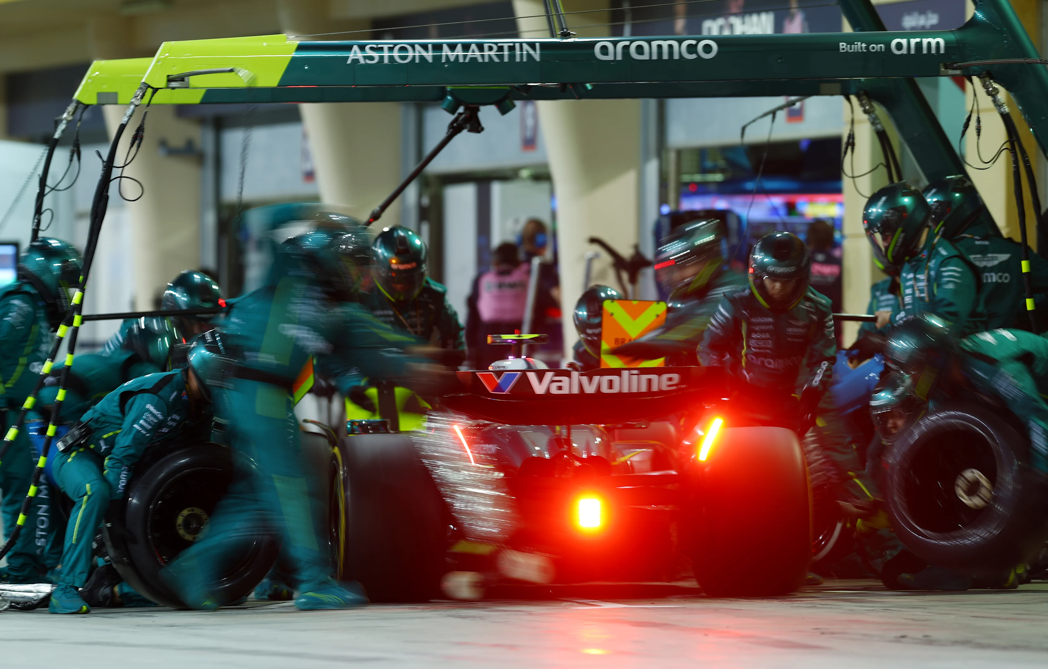 BAHRAIN, BAHRAIN - APRIL 13: Fernando Alonso of Spain driving the (14) Aston Martin F1 Team AMR25 Mercedes makes a pitstop during the F1 Grand Prix of Bahrain at Bahrain International Circuit on April 13, 2025 in Bahrain, Bahrain. (Photo by Bryn Lennon - Formula 1/Formula 1 via Getty Images)