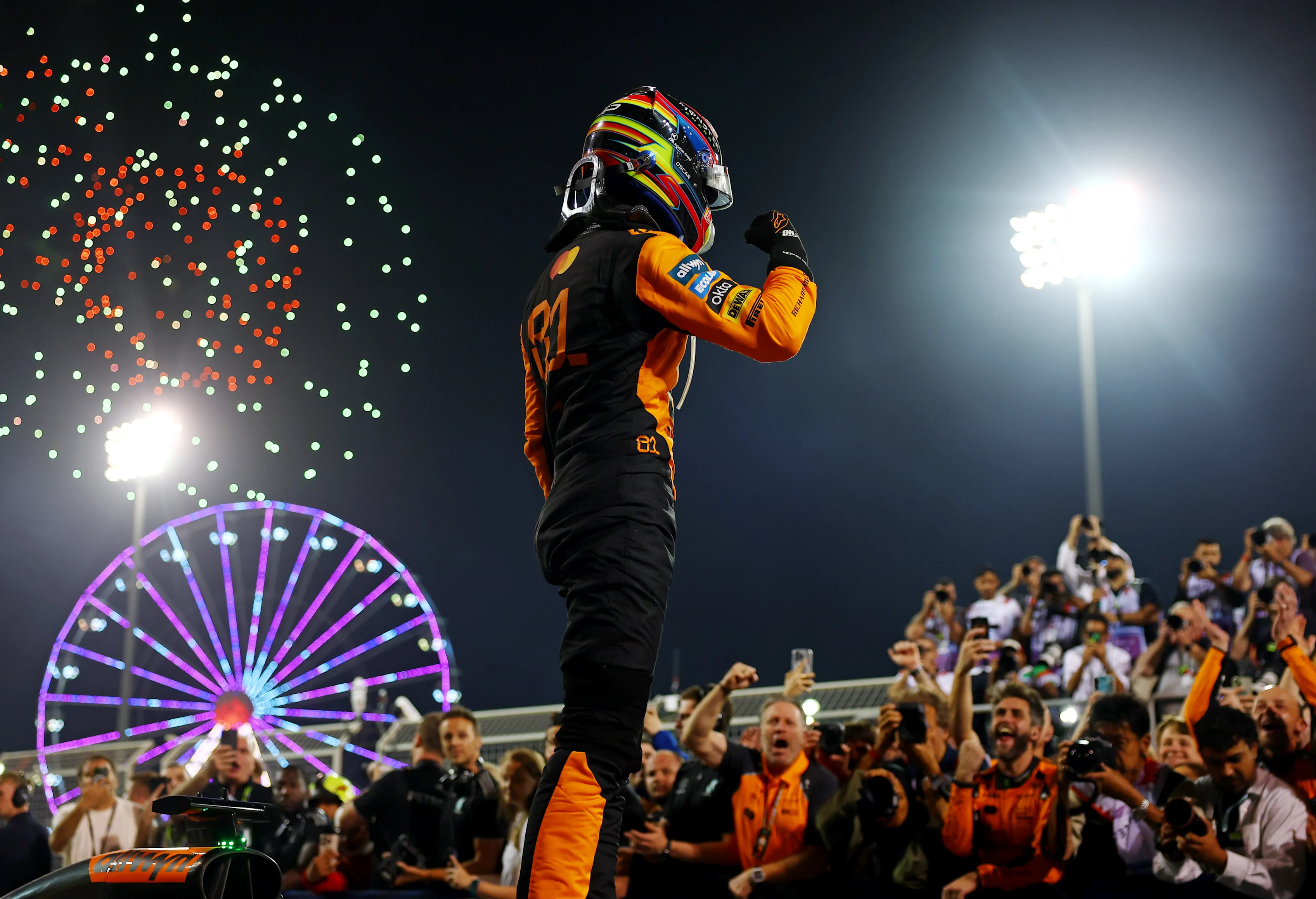 BAHRAIN, BAHRAIN - APRIL 13: Race winner Oscar Piastri of Australia and McLaren celebrates on arrival in parc ferme during the F1 Grand Prix of Bahrain at Bahrain International Circuit on April 13, 2025 in Bahrain, Bahrain. (Photo by Bryn Lennon - Formula 1/Formula 1 via Getty Images)