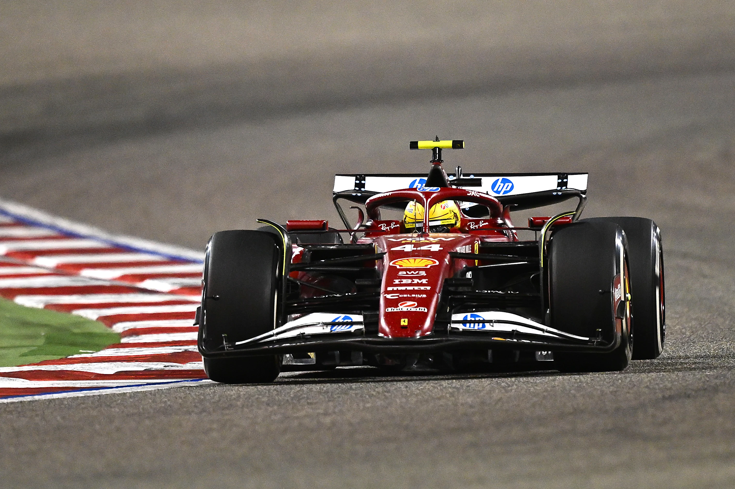 BAHRAIN, BAHRAIN - APRIL 13: Lewis Hamilton of Great Britain driving the (44) Scuderia Ferrari