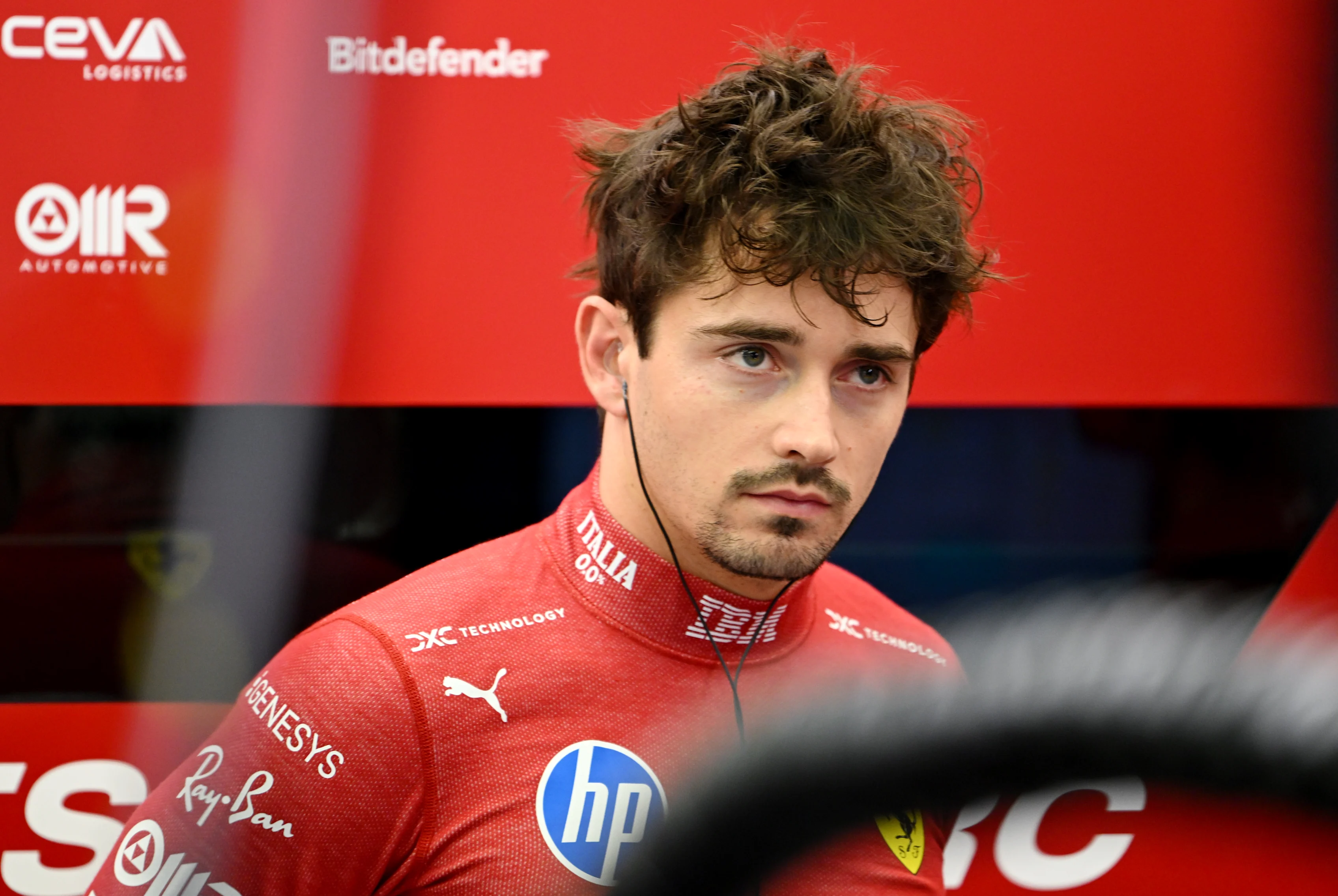 BAHRAIN, BAHRAIN - APRIL 11: Charles Leclerc of Monaco and Scuderia Ferrari looks on in the garage during practice ahead of the F1 Grand Prix of Bahrain at Bahrain International Circuit on April 11, 2025 in Bahrain, Bahrain. (Photo by Mark Sutton - Formula 1/Formula 1 via Getty Images)