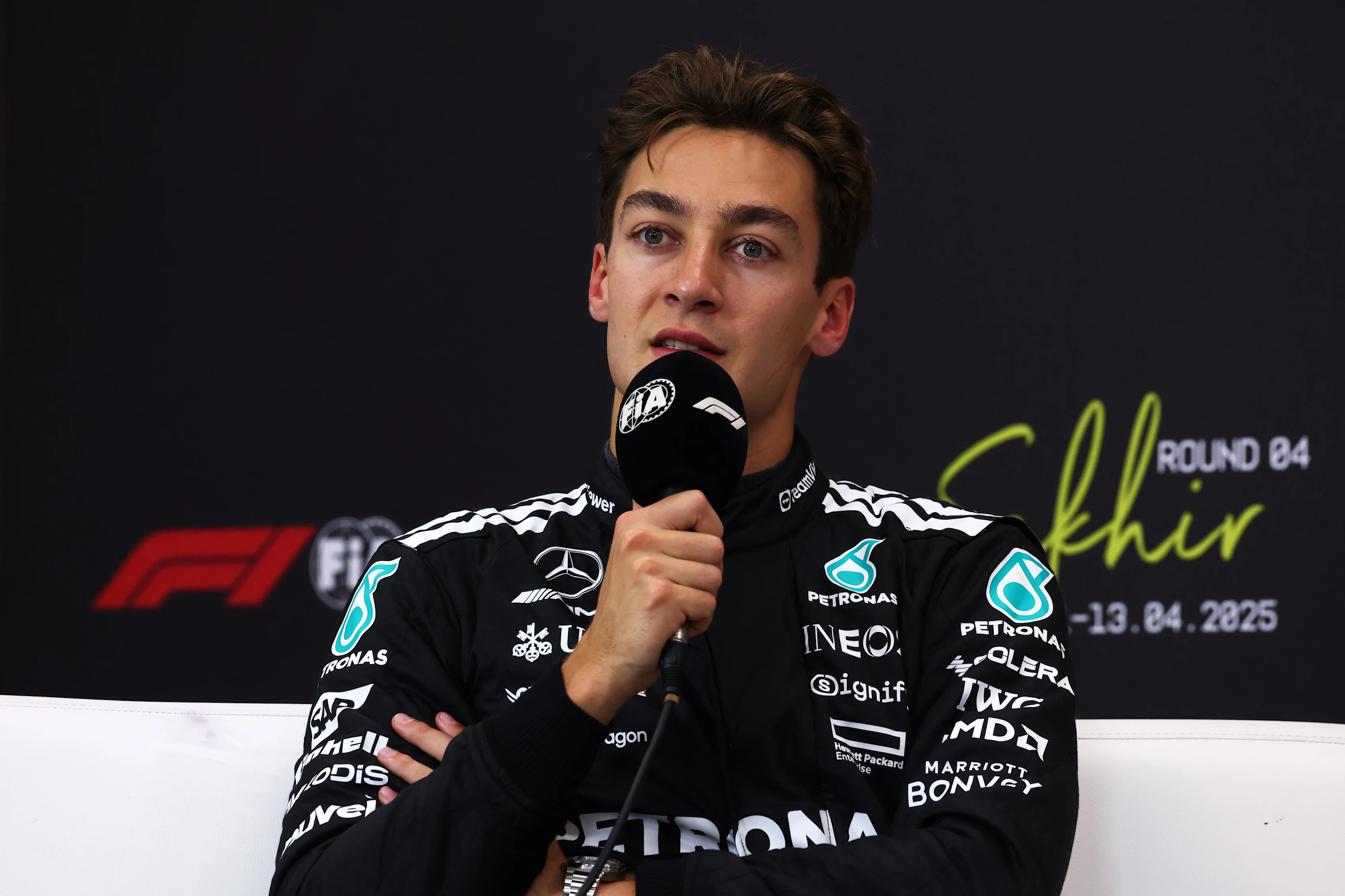 BAHRAIN, BAHRAIN - APRIL 12: Second placed qualifier George Russell of Great Britain and Mercedes AMG Petronas F1 Team in the Drivers Press Conference during qualifying ahead of the F1 Grand Prix of Bahrain at Bahrain International Circuit on April 12, 2025 in Bahrain, Bahrain. (Photo by Clive Rose/Getty Images)