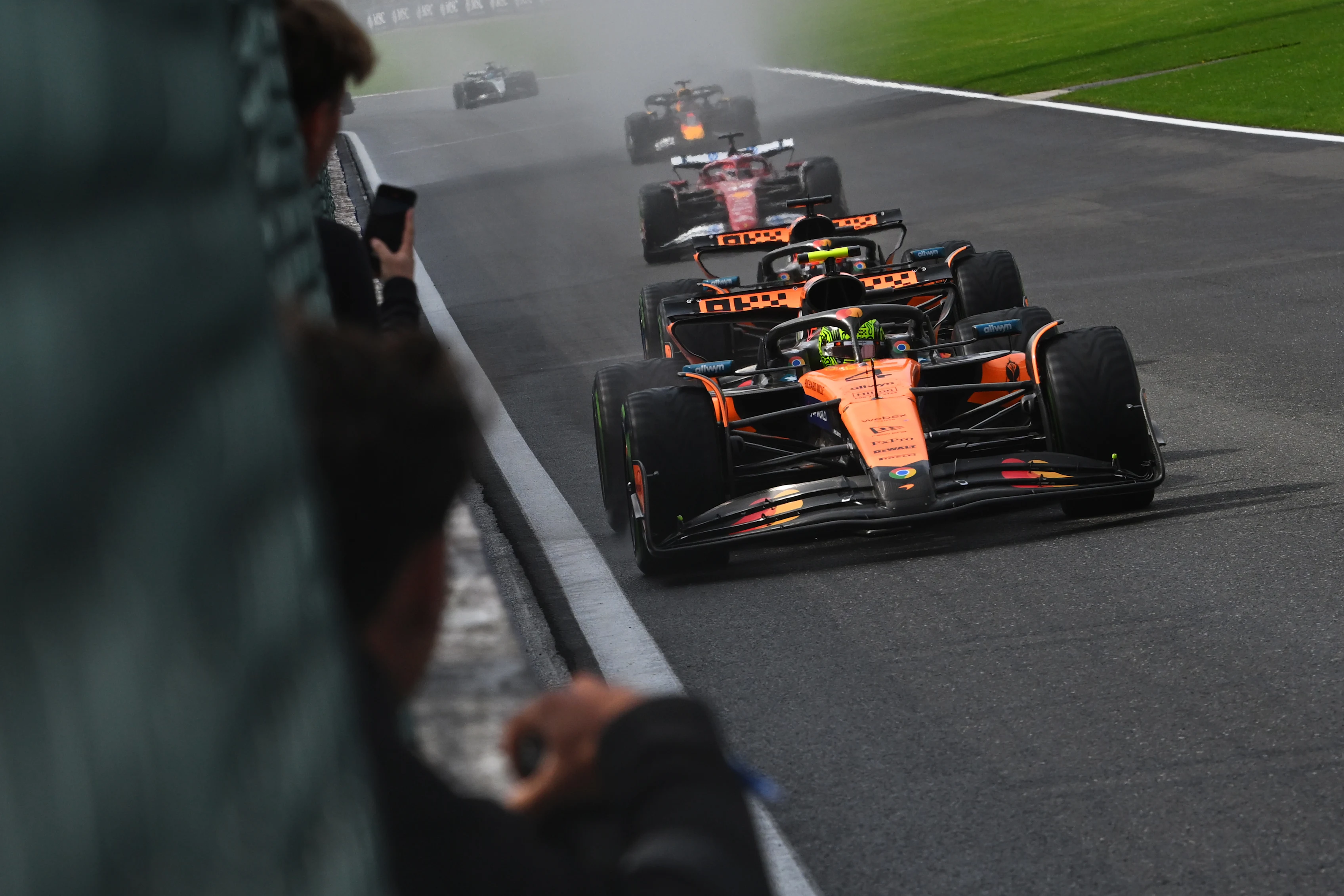 SPA, BELGIUM - JULY 27: Lando Norris of Great Britain driving the (4) McLaren MCL39 Mercedes leads