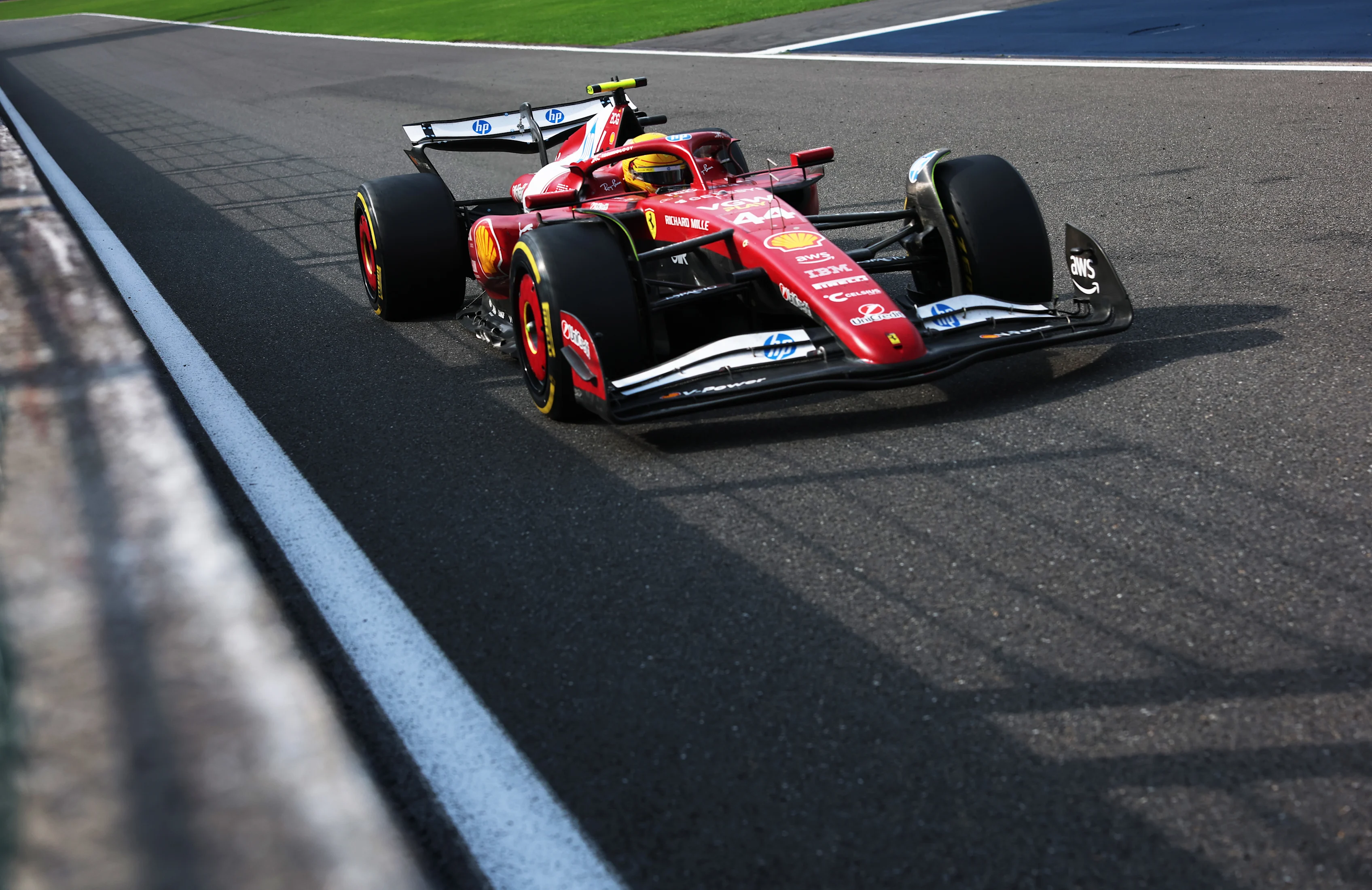 SPA, BELGIUM - JULY 27: Lewis Hamilton of Great Britain driving the (44) Scuderia Ferrari SF-25 on
