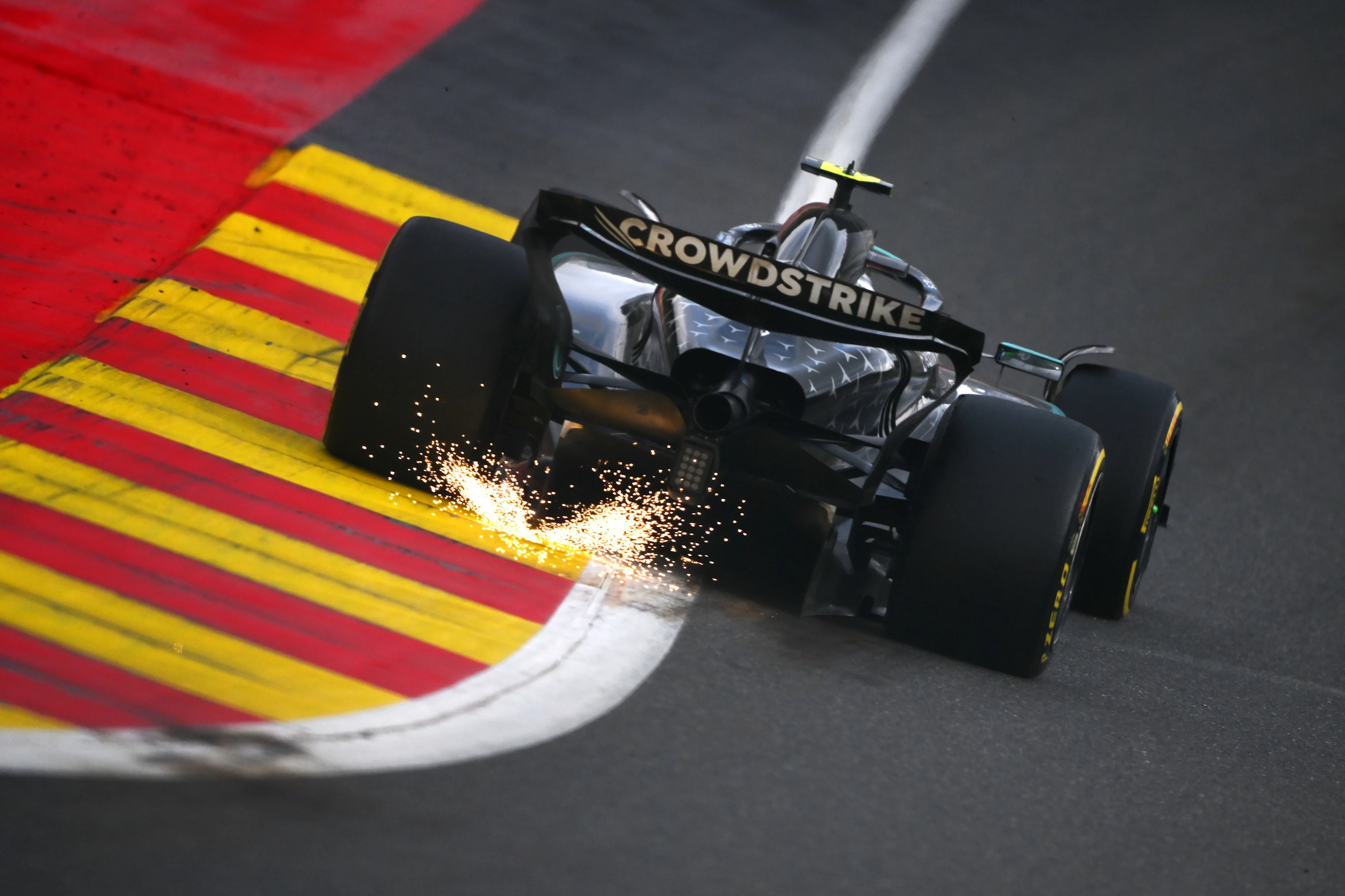 SPA, BELGIUM - JULY 27: Sparks fly behind Andrea Kimi Antonelli of Italy driving the (12) Mercedes
