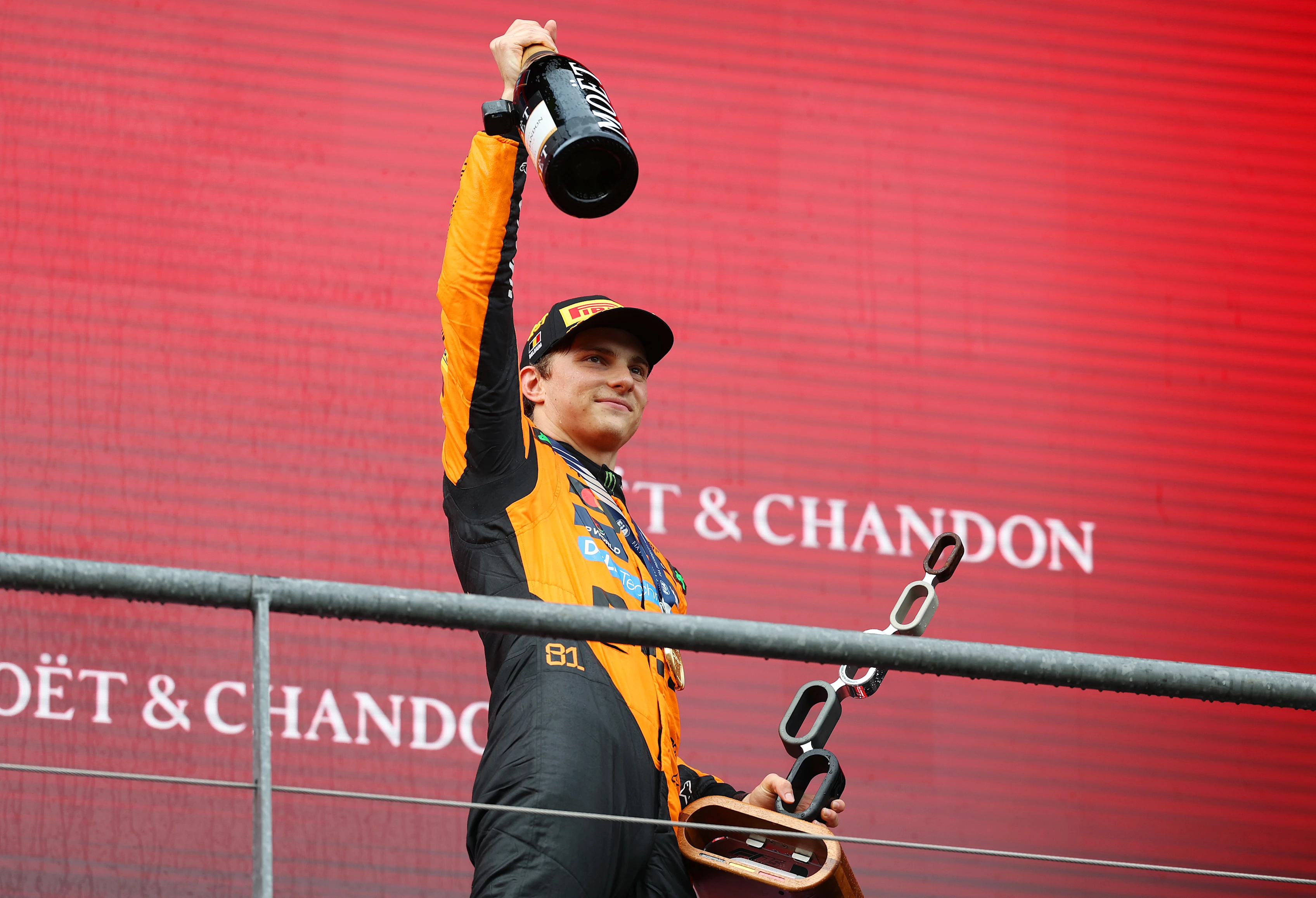 SPA, BELGIUM - JULY 27: Race winner Oscar Piastri of Australia and McLaren leaves the podium with