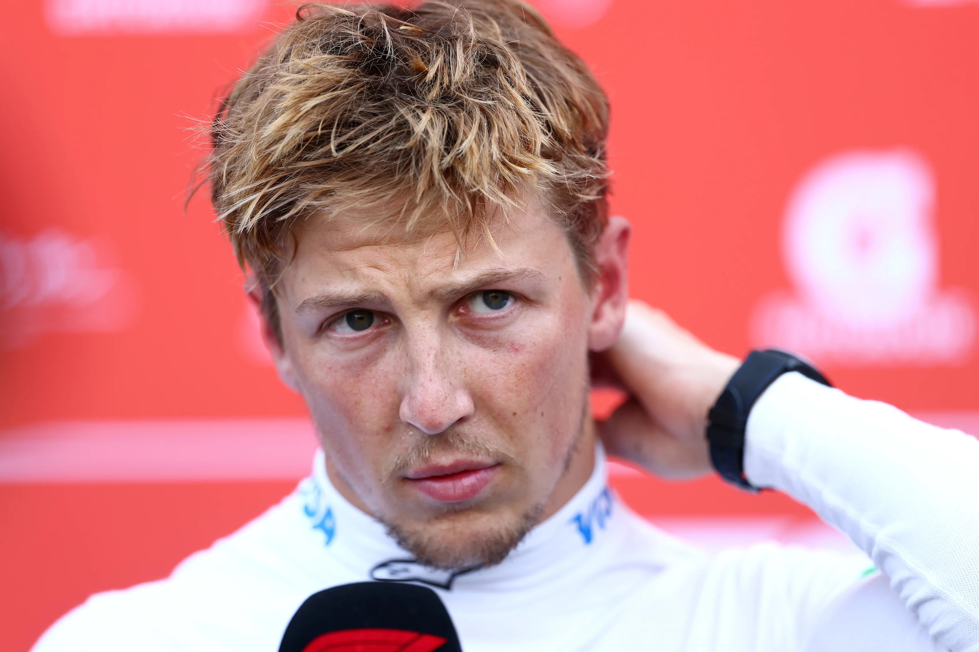 SPA, BELGIUM - JULY 25: Liam Lawson of New Zealand and Visa Cash App Racing Bulls is interviewed