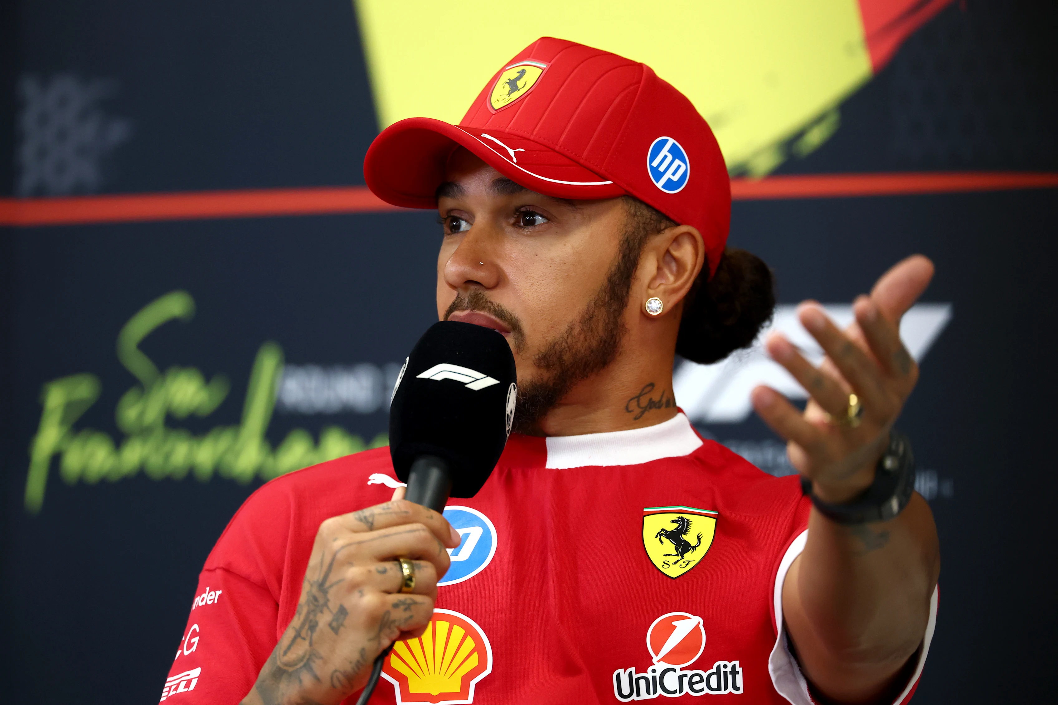 SPA, BELGIUM - JULY 24: Lewis Hamilton of Great Britain and Scuderia Ferrari looks on in the