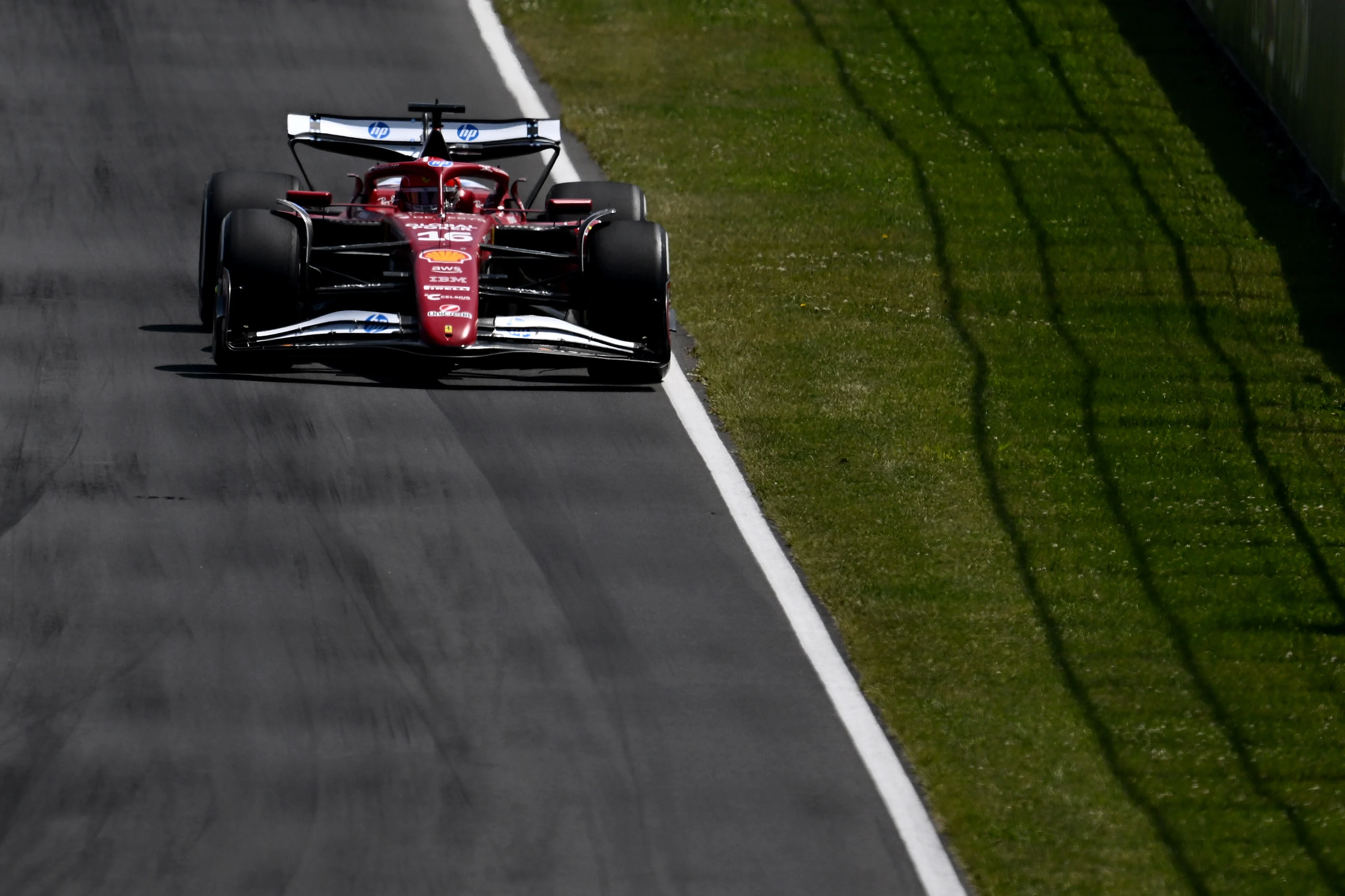 MONTREAL, QUEBEC - JUNE 15: Charles Leclerc of Monaco driving the (16) Scuderia Ferrari SF-25 on