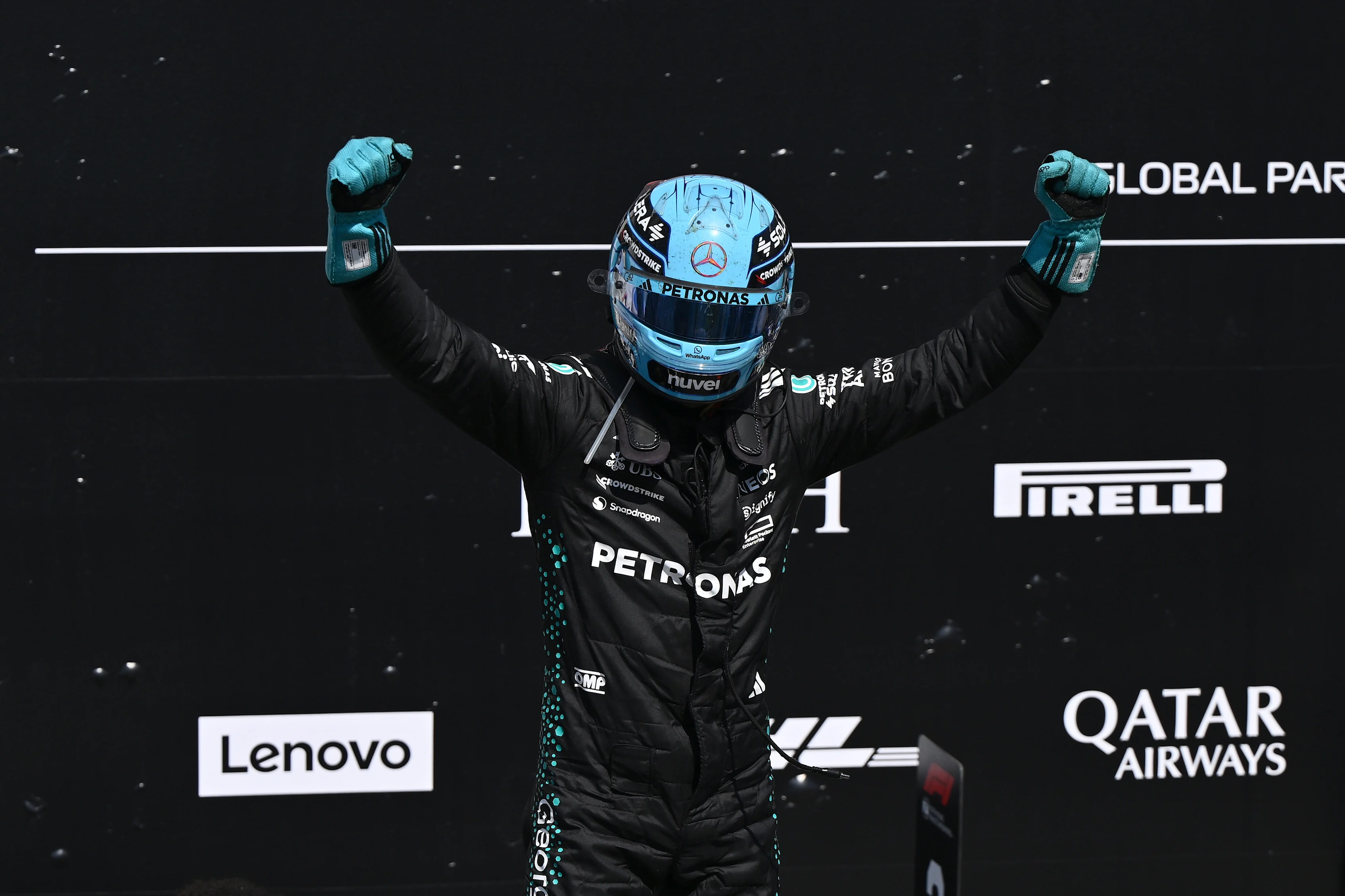 MONTREAL, QUEBEC - JUNE 15: Race winner George Russell of Great Britain and Mercedes AMG Petronas F1 Team celebrates on arrival in parc ferme during the F1 Grand Prix of Canada at Circuit Gilles-Villeneuve on June 15, 2025 in Montreal, Quebec. (Photo by Minas Panagiotakis/Getty Images)