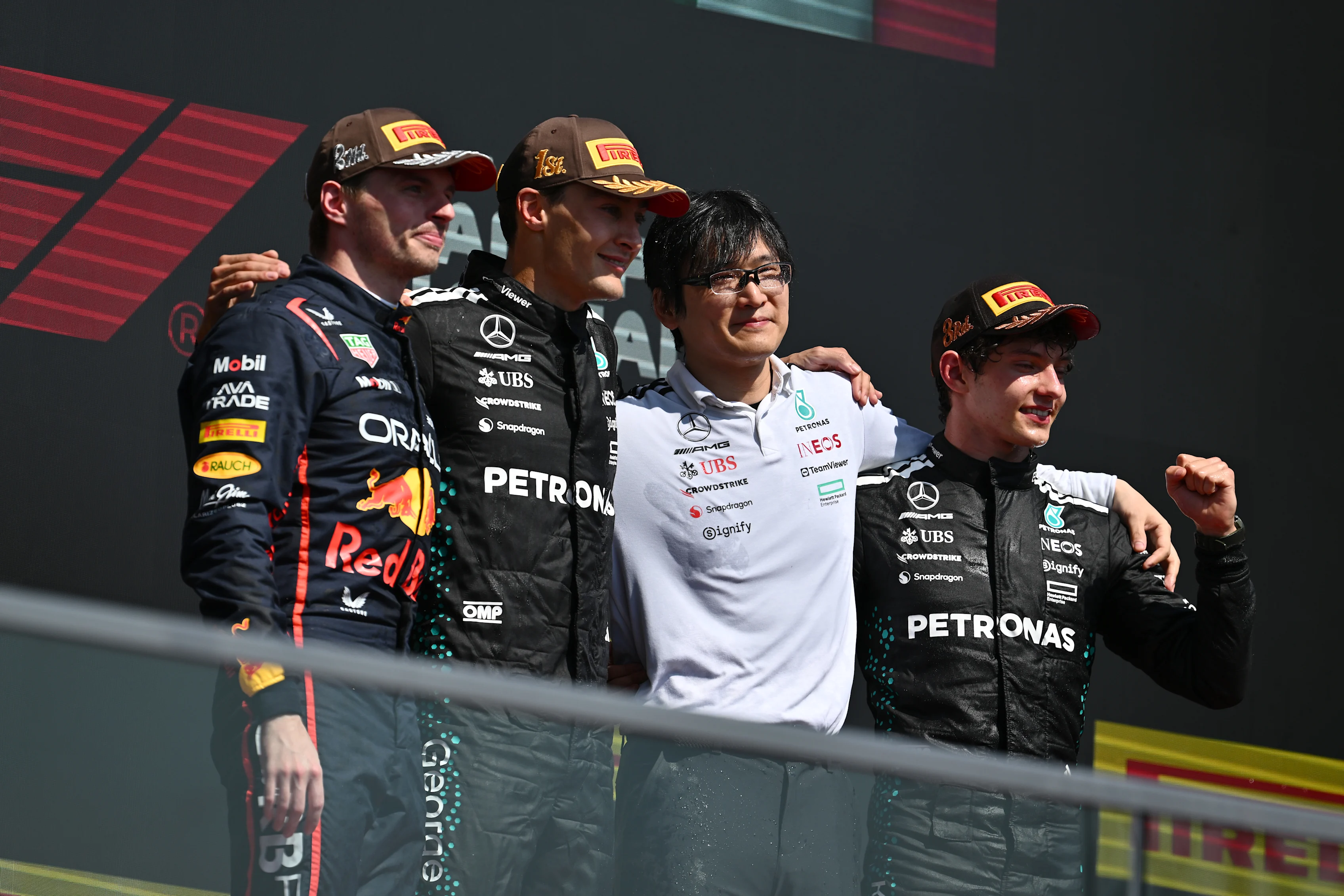 George Russell, Max Verstappen, Andrea Kimi Antonelli and Katsu Kuwahara on the podium during the F1 Grand Prix of Canada at Circuit Gilles-Villeneuve on June 15, 2025 in Montreal, Quebec. (Photo by Minas Panagiotakis/Getty Images)