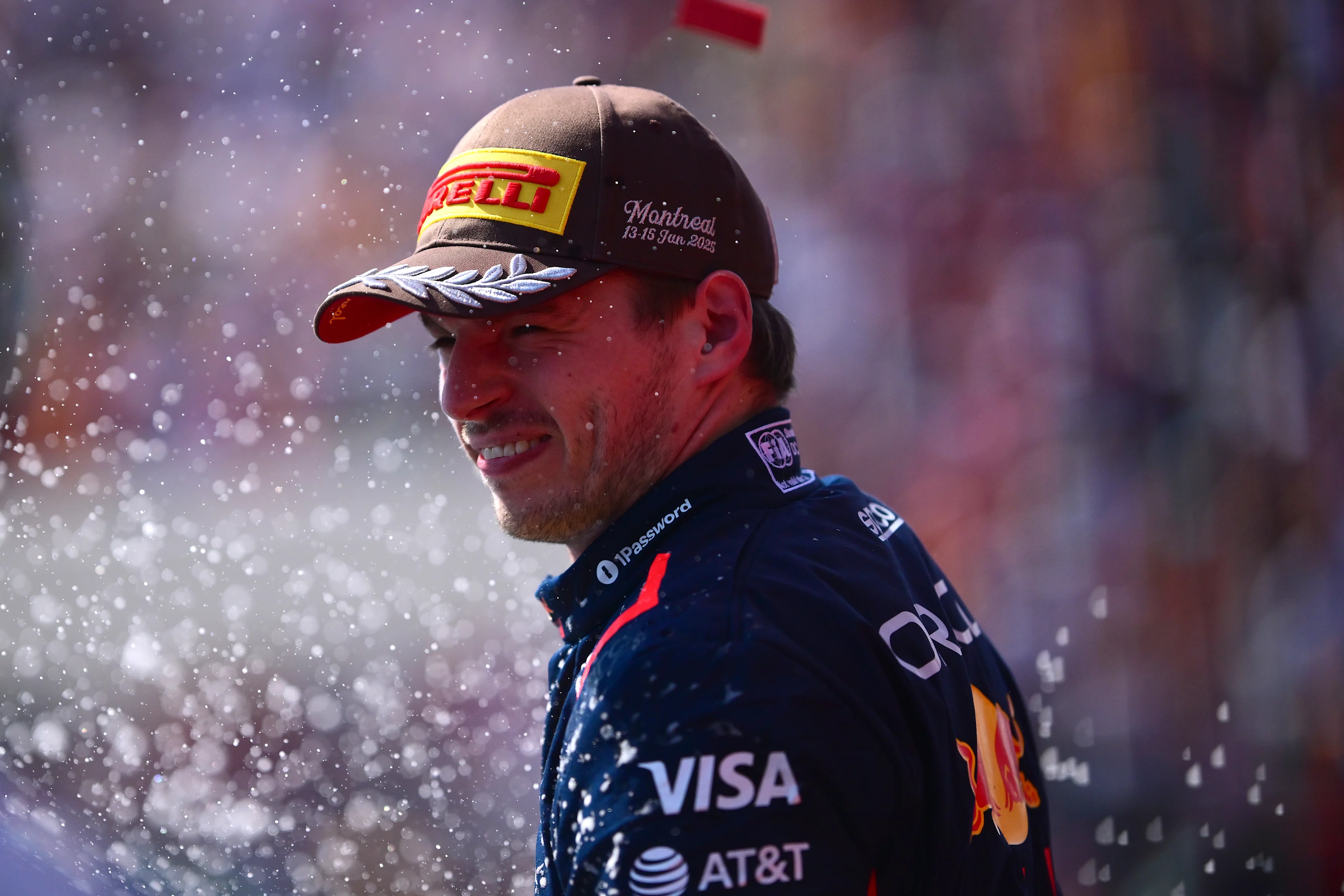 MONTREAL, QUEBEC - JUNE 15: Second placed Max Verstappen of the Netherlands and Oracle Red Bull Racing celebrates on the podium during the F1 Grand Prix of Canada at Circuit Gilles-Villeneuve on June 15, 2025 in Montreal, Quebec. (Photo by Mario Renzi - Formula 1/Formula 1 via Getty Images)