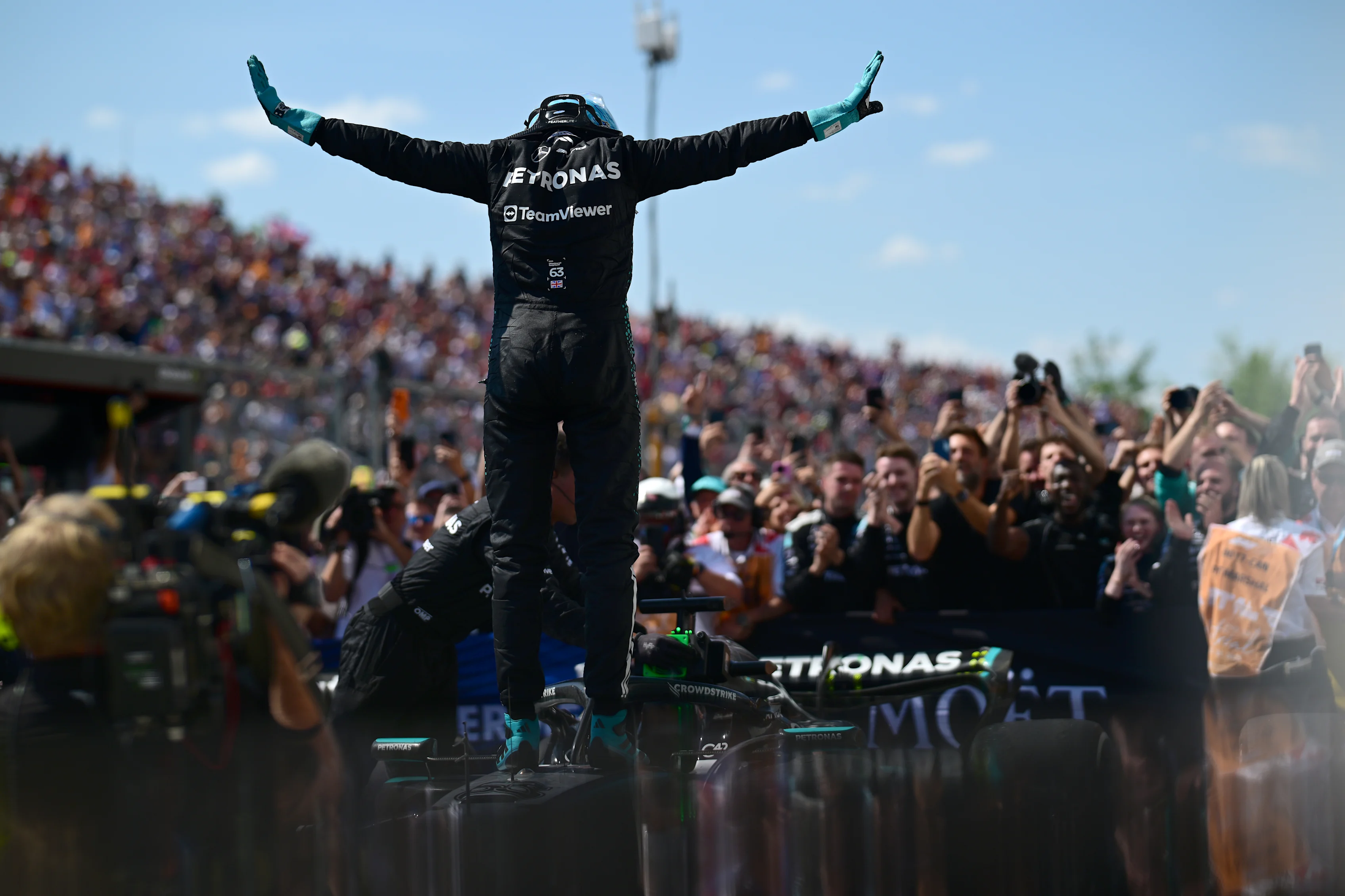 MONTREAL, QUEBEC - JUNE 15: Race winner George Russell of Great Britain and Mercedes AMG Petronas F1 Team celebrates on arrival in parc ferme during the F1 Grand Prix of Canada at Circuit Gilles-Villeneuve on June 15, 2025 in Montreal, Quebec. (Photo by Mario Renzi - Formula 1/Formula 1 via Getty Images)