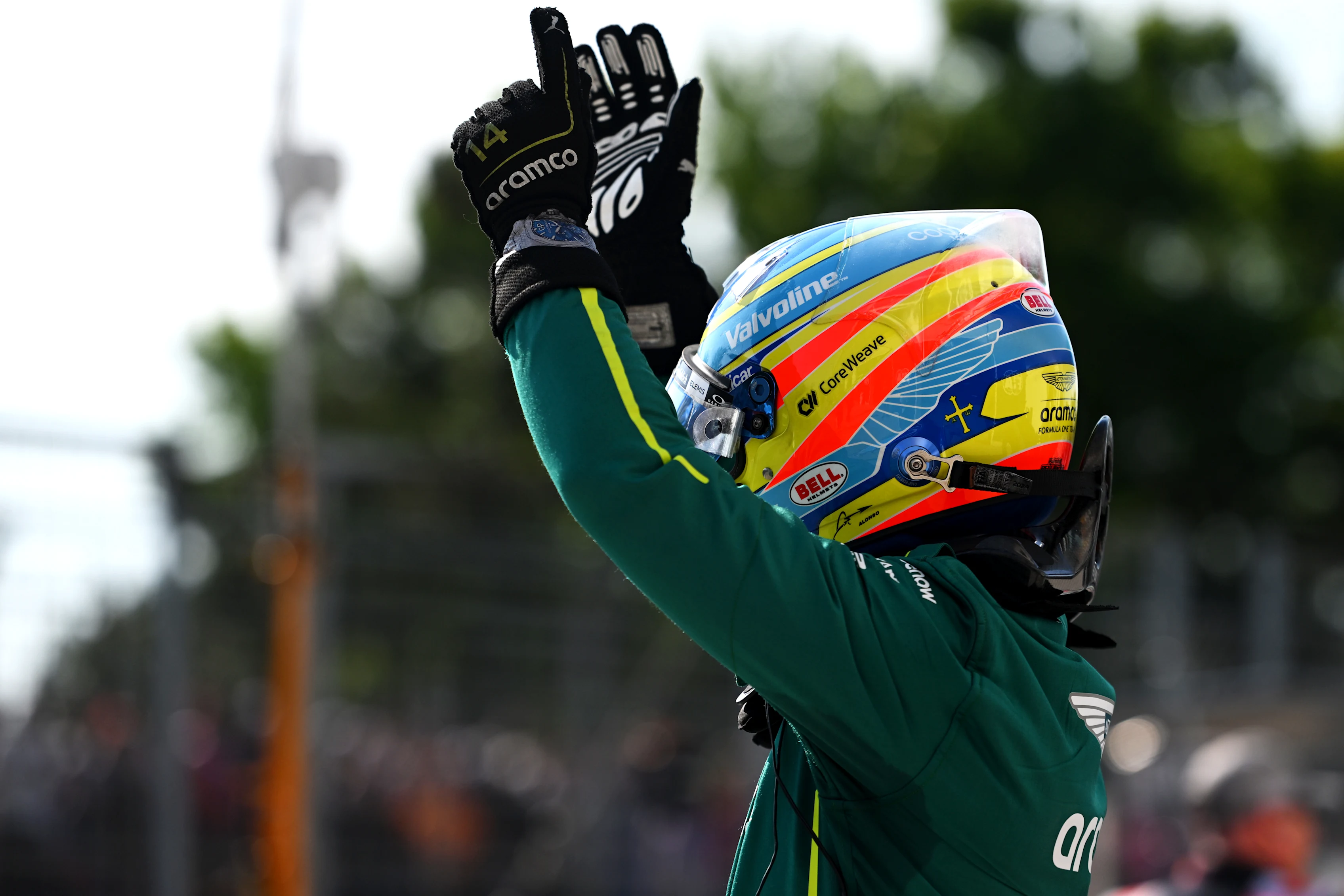 MONTREAL, QUEBEC - JUNE 14: Sixth placed qualifier Fernando Alonso of Spain and Aston Martin F1 Team celebrates in parc ferme during qualifying ahead of the F1 Grand Prix of Canada at Circuit Gilles-Villeneuve on June 14, 2025 in Montreal, Quebec. (Photo by Rudy Carezzevoli/Getty Images)