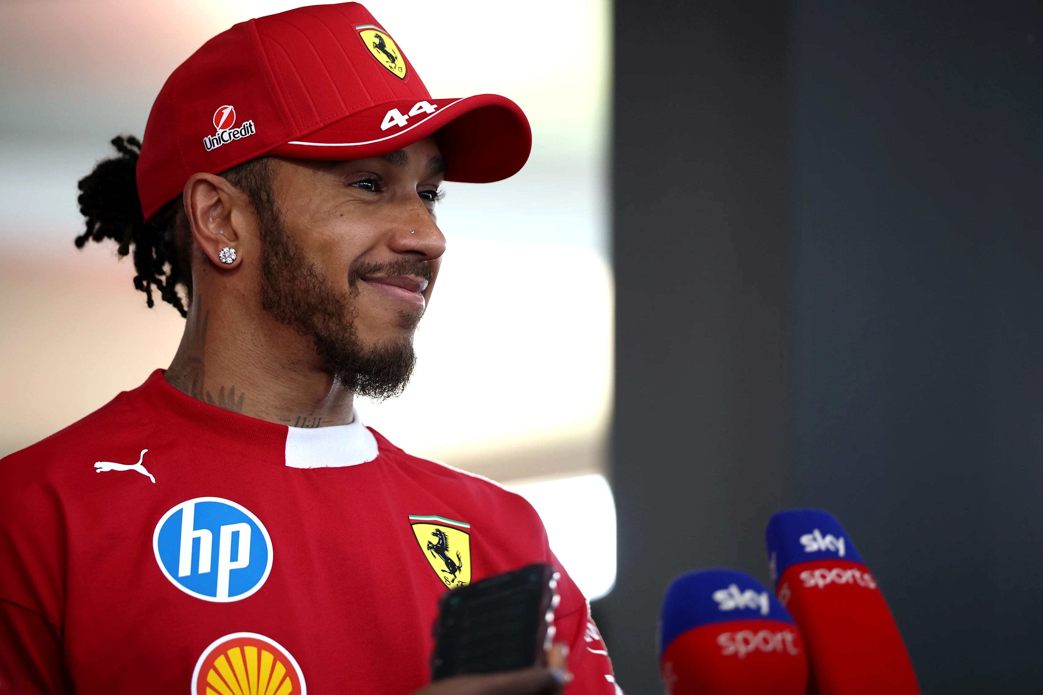 MONTREAL, QUEBEC - JUNE 14: Fifth placed qualifier Lewis Hamilton of Great Britain and Scuderia Ferrari is interviewed during qualifying ahead of the F1 Grand Prix of Canada at Circuit Gilles-Villeneuve on June 14, 2025 in Montreal, Quebec. (Photo by Jared C. Tilton - Formula 1/Formula 1 via Getty Images)