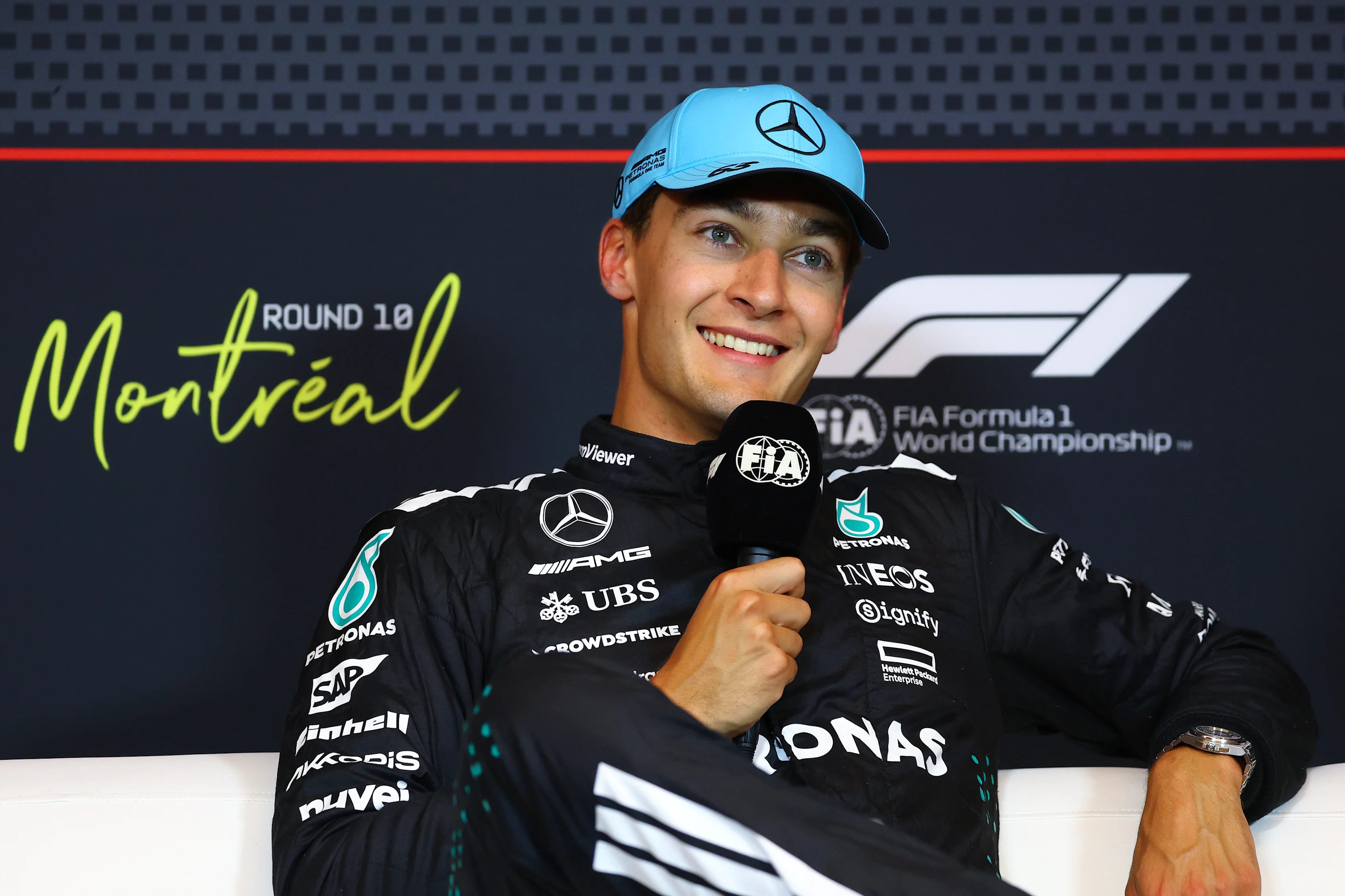 MONTREAL, QUEBEC - JUNE 14: Pole position qualifier George Russell of Great Britain and Mercedes AMG Petronas F1 Team in the Drivers Press Conference during qualifying ahead of the F1 Grand Prix of Canada at Circuit Gilles-Villeneuve on June 14, 2025 in Montreal, Quebec. (Photo by Clive Rose/Getty Images)