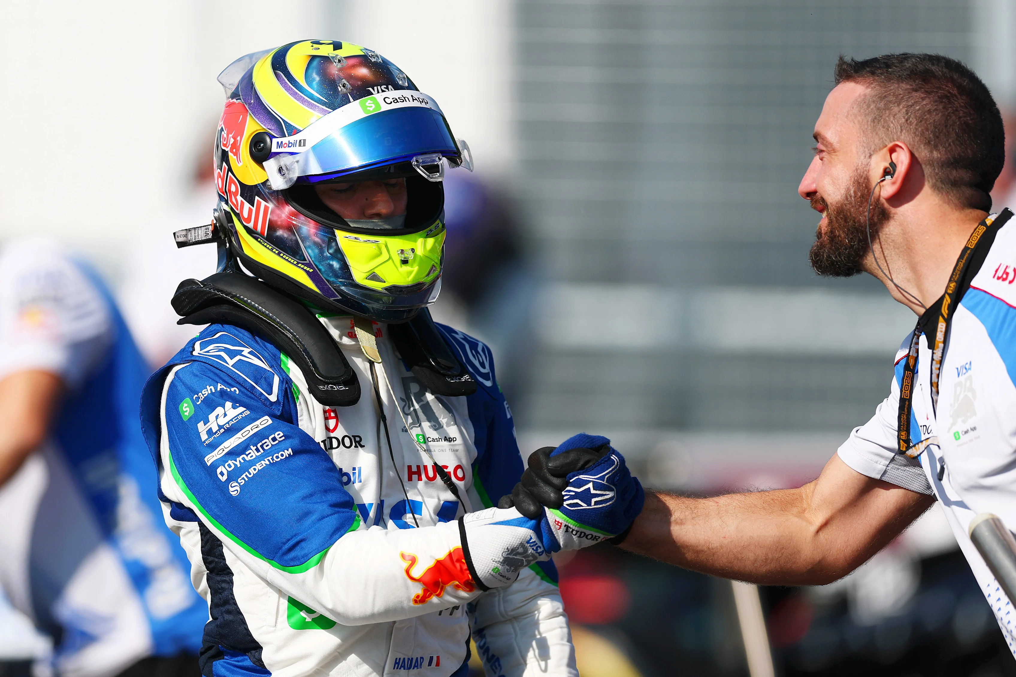 MONTREAL, QUEBEC - JUNE 14: Ninth placed qualifier Isack Hadjar of France and Visa Cash App Racing Bulls celebrates with a teammate in parc ferme during qualifying ahead of the F1 Grand Prix of Canada at Circuit Gilles-Villeneuve on June 14, 2025 in Montreal, Quebec. (Photo by Clive Rose/Getty Images)