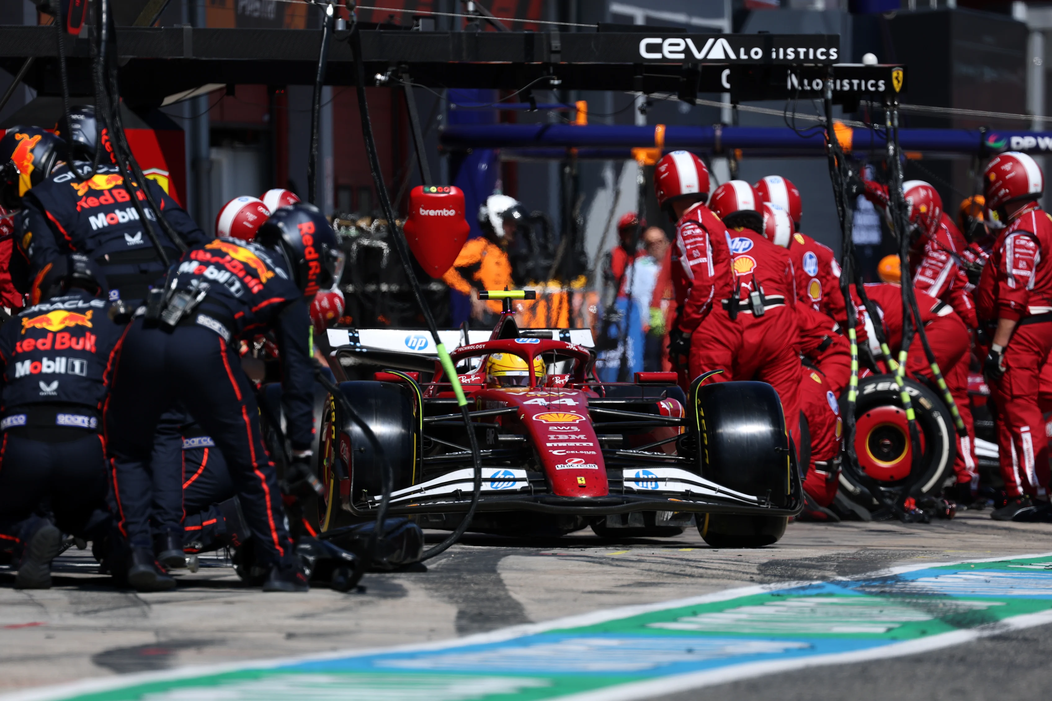 IMOLA, ITALY - MAY 18: Lewis Hamilton of Great Britain driving the (44) Scuderia Ferrari SF-25 makes a pitstop during the F1 Grand Prix of Emilia-Romagna at Autodromo Internazionale Enzo e Dino Ferrari on May 18, 2025 in Imola, Italy. (Photo by Mark Thompson/Getty Images)