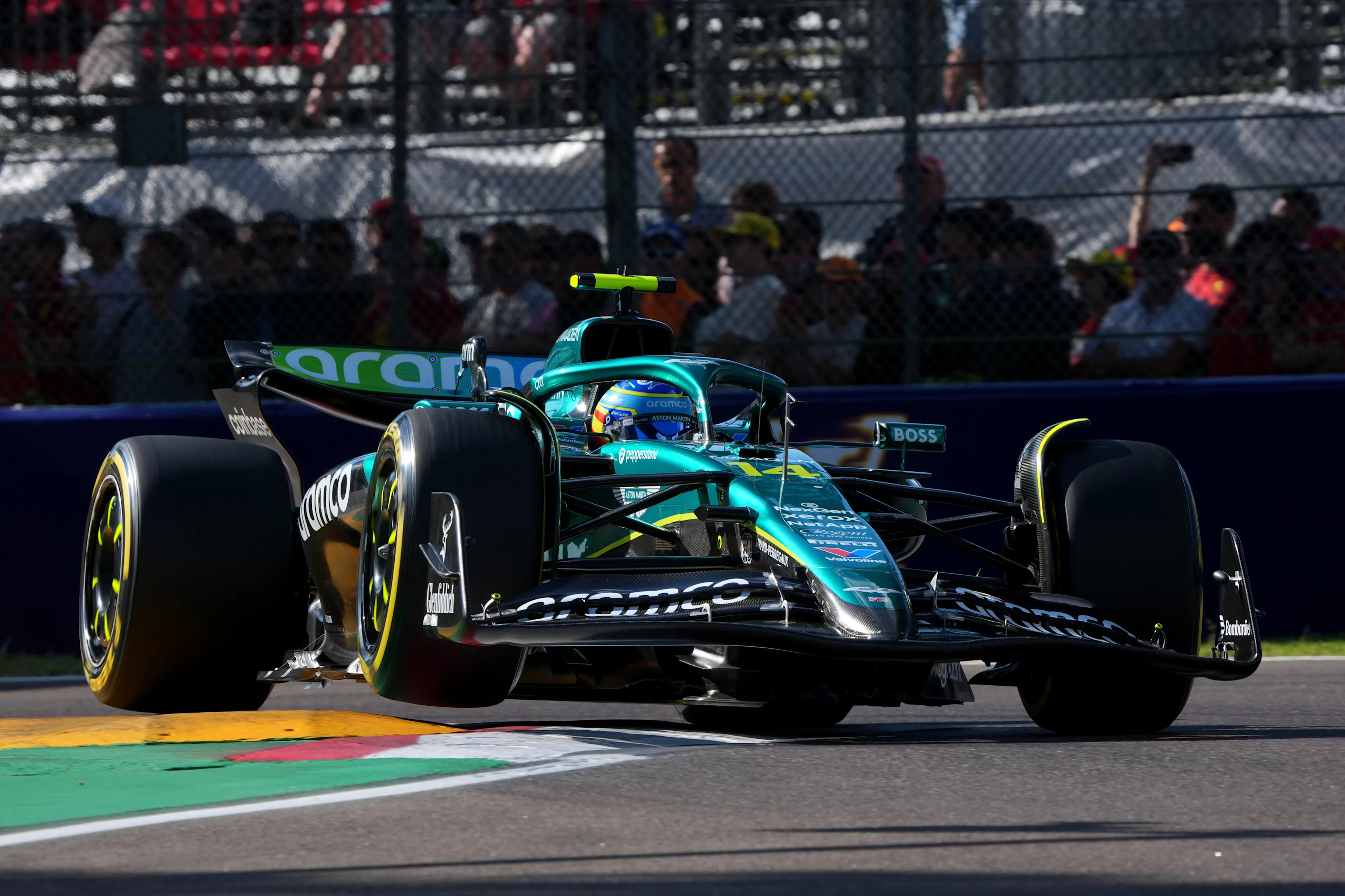 IMOLA, ITALY - MAY 17: Fernando Alonso of Spain driving the (14) Aston Martin F1 Team AMR25 Mercedes lifts a wheel on track during qualifying ahead of the F1 Grand Prix of Emilia-Romagna at Autodromo Internazionale Enzo e Dino Ferrari on May 17, 2025 in Imola, Italy. (Photo by Malcolm Griffiths - Formula 1/Formula 1 via Getty Images)