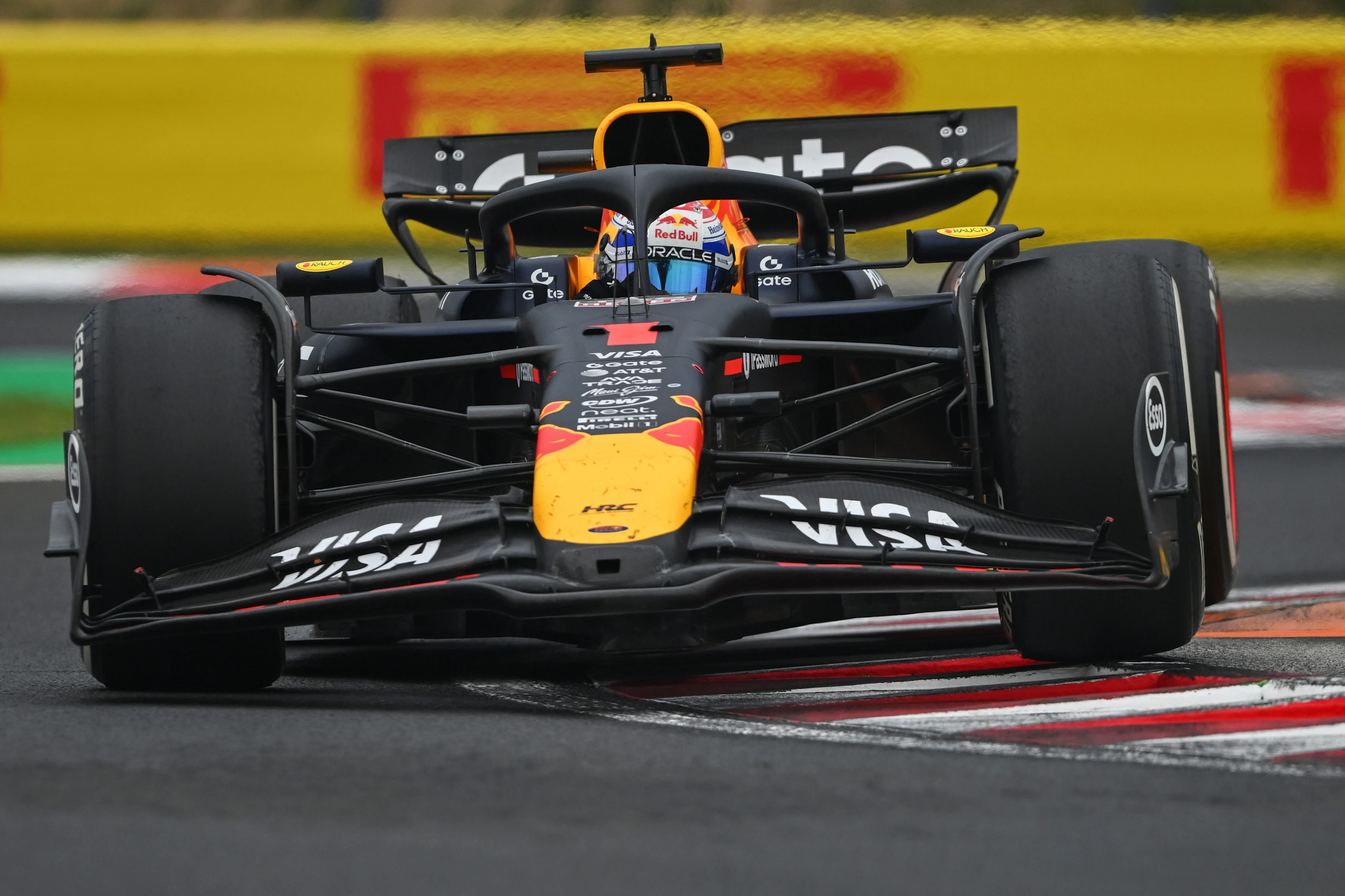 BUDAPEST, HUNGARY - AUGUST 03: Max Verstappen of the Netherlands driving the (1) Oracle Red Bull