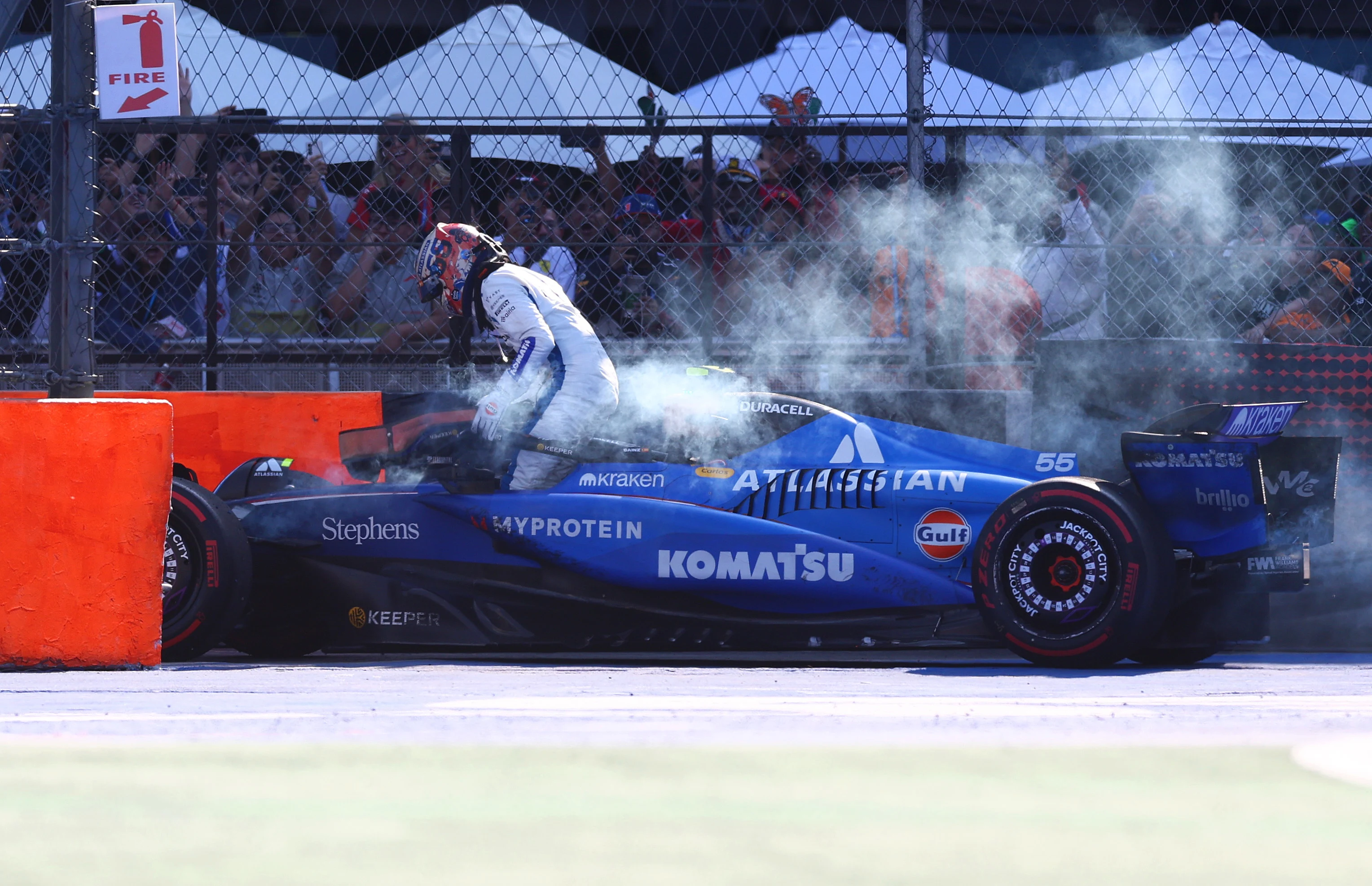MEXICO CITY, MEXICO - OCTOBER 26: Carlos Sainz of Spain and Williams climbs out of his car after