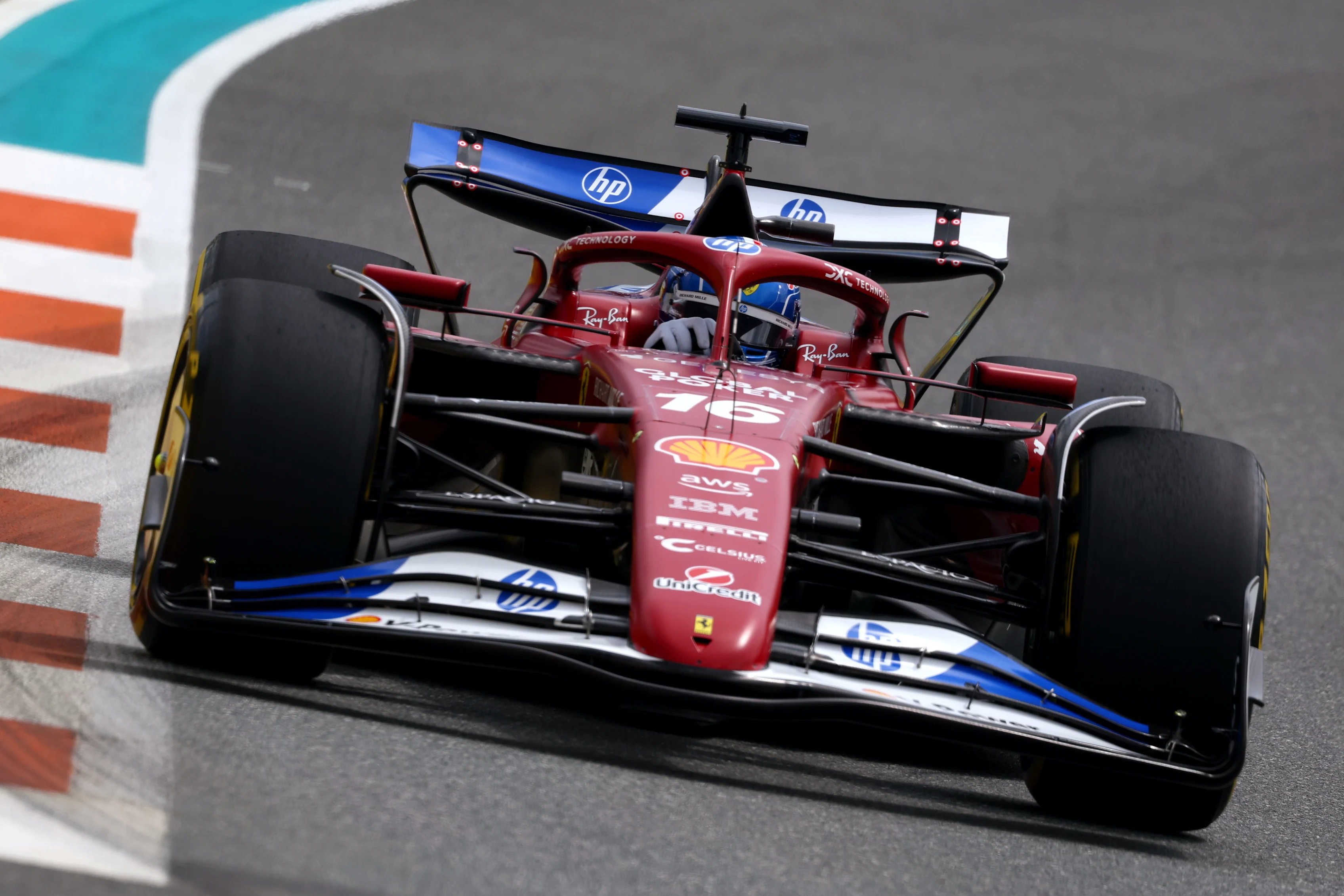 MIAMI, FLORIDA - MAY 04: Charles Leclerc of Monaco driving the (16) Scuderia Ferrari SF-25 heads to the grid during the F1 Grand Prix of Miami at Miami International Autodrome on May 04, 2025 in Miami, Florida. (Photo by Clive Rose/Getty Images)