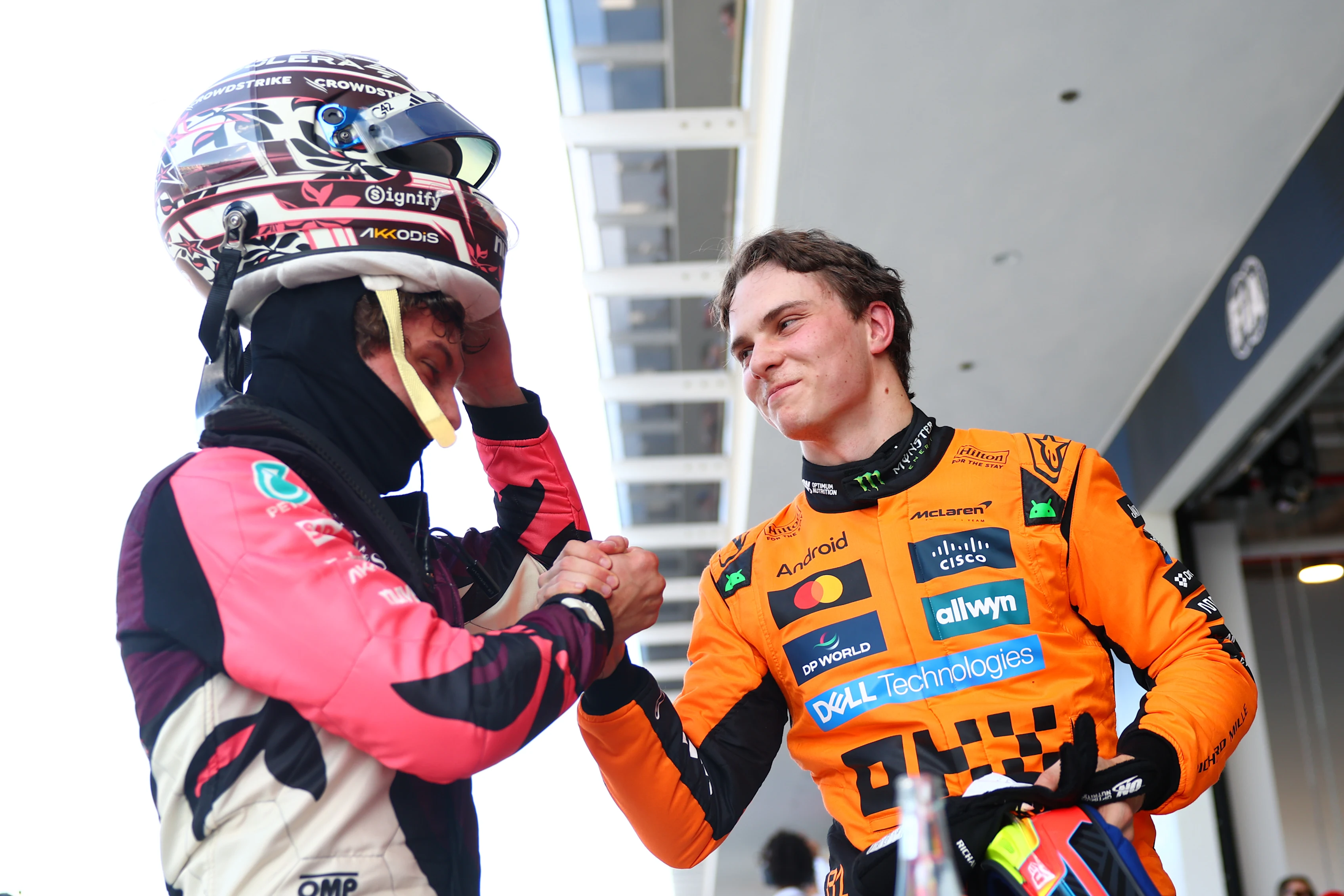 MIAMI, FLORIDA - MAY 02: Sprint Pole qualifier Andrea Kimi Antonelli of Italy and Mercedes AMG Petronas F1 Team and Sprint 2nd qualifier Oscar Piastri of Australia and McLaren congratulate each other in parc ferme during Sprint qualifying ahead of the F1 Grand Prix of Miami at Miami International Autodrome on May 02, 2025 in Miami, Florida. (Photo by Bryn Lennon - Formula 1/Formula 1 via Getty Images)