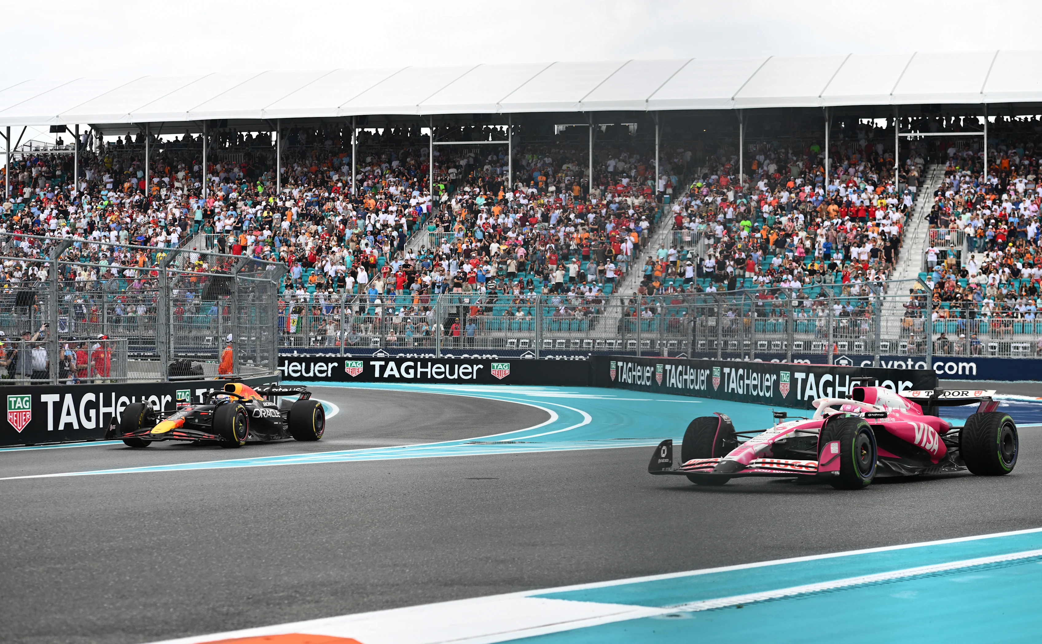 MIAMI, FLORIDA - MAY 03: Max Verstappen of the Netherlands driving the (1) Oracle Red Bull Racing RB21 leads Isack Hadjar of France driving the (6) Visa Cash App Racing Bulls VCARB 02 as he emerges from the pitlane during the Sprint ahead of the F1 Grand Prix of Miami at Miami International Autodrome on May 03, 2025 in Miami, Florida. (Photo by Rudy Carezzevoli/Getty Images)