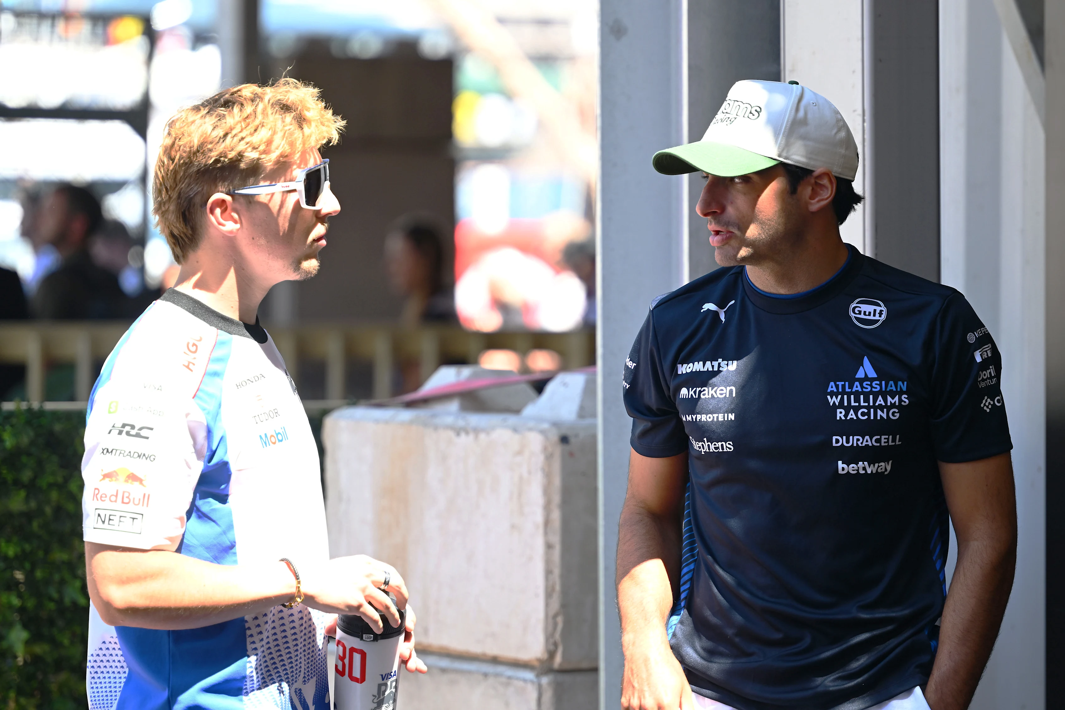 Liam Lawson of Visa Cash App Racing Bulls talks with Carlos Sainz of Williams prior to the F1 Grand Prix of Monaco at Circuit de Monaco on May 25, 2025 in Monte-Carlo, Monaco. (Photo by Mark Sutton - Formula 1/Formula 1 via Getty Images)