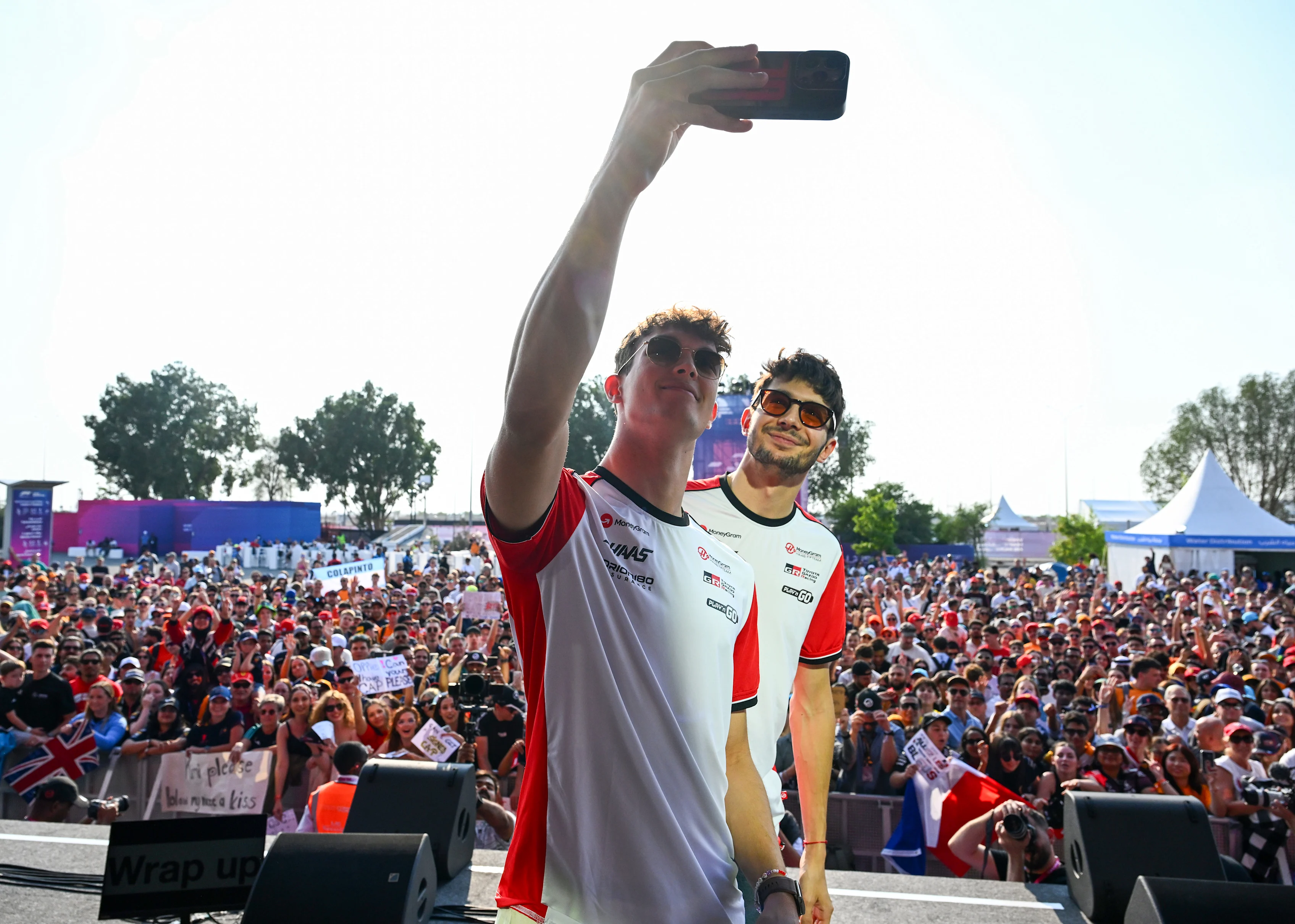 LUSAIL CITY, QATAR - NOVEMBER 29: Oliver Bearman of Great Britain and Haas F1 and Esteban Ocon of