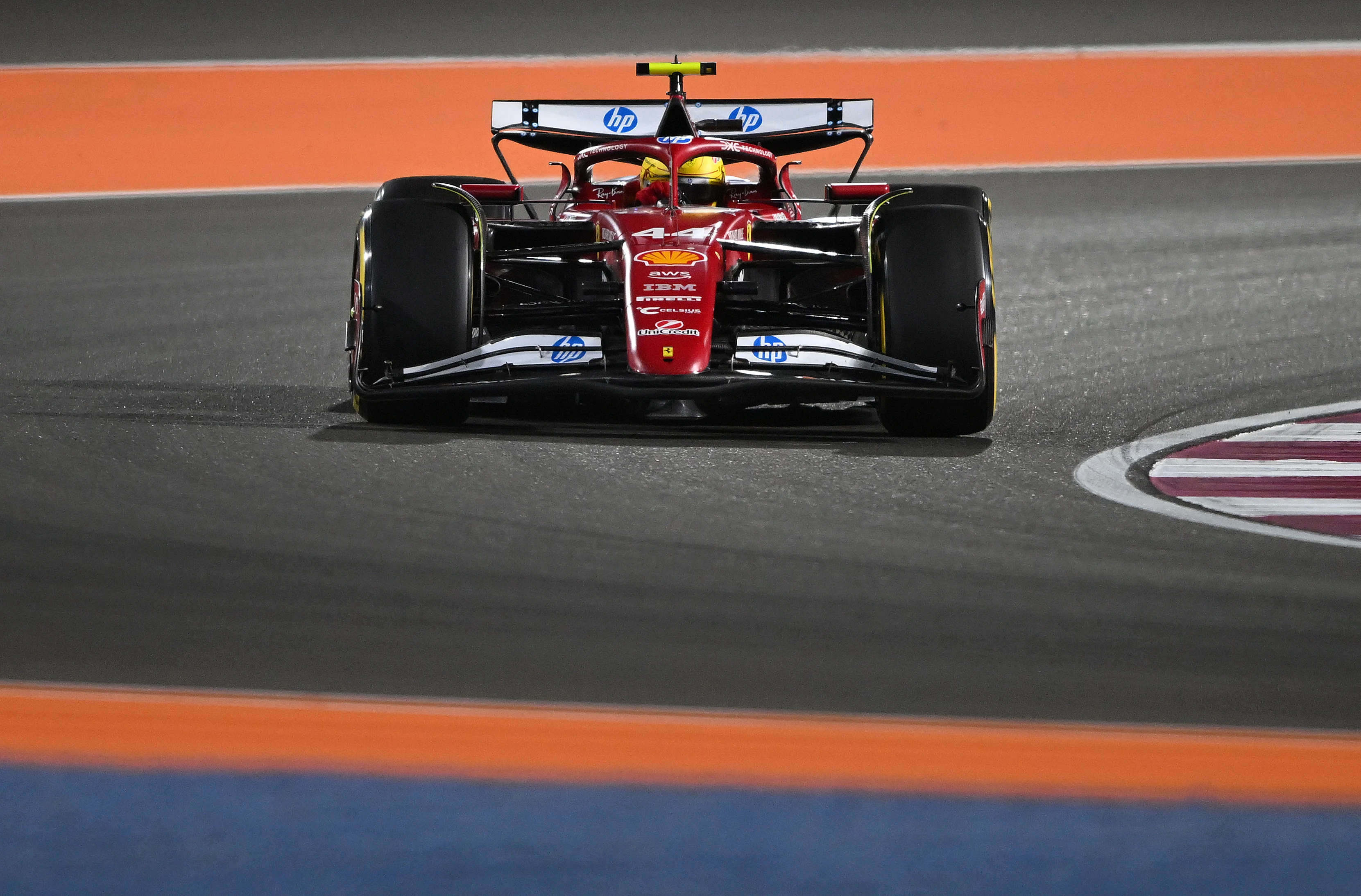 LUSAIL CITY, QATAR - NOVEMBER 29: Lewis Hamilton of Great Britain driving the (44) Scuderia Ferrari