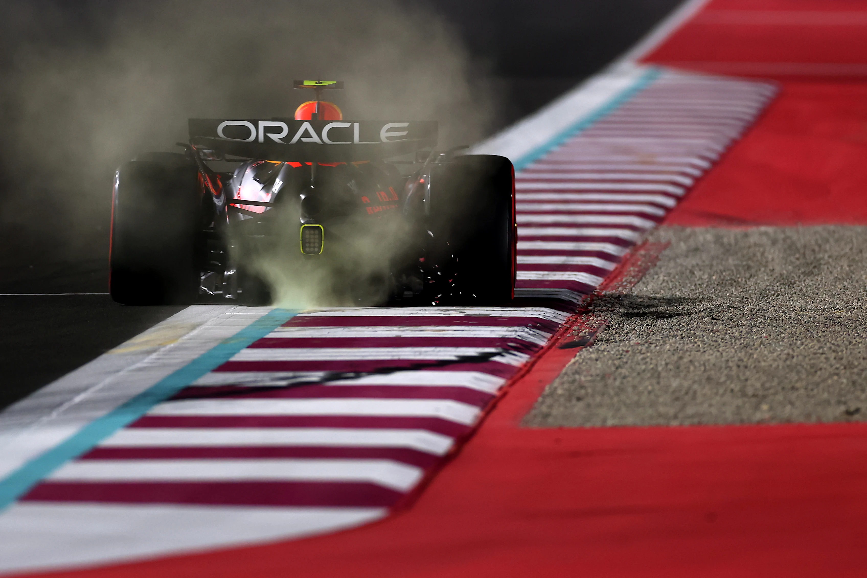 LUSAIL CITY, QATAR - NOVEMBER 29: Sparks fly behind Yuki Tsunoda of Japan driving the (22) Oracle