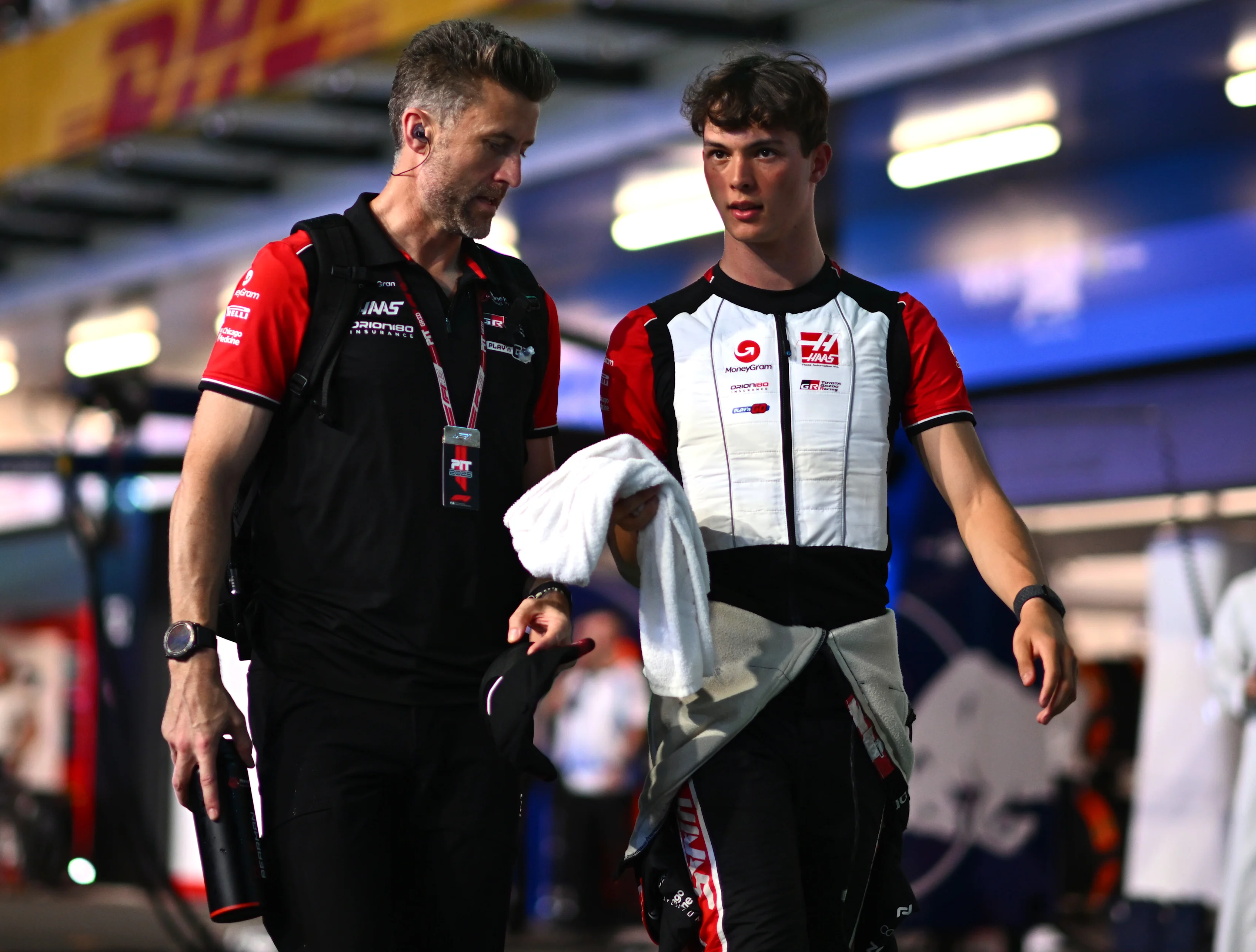 JEDDAH, SAUDI ARABIA - APRIL 20: Oliver Bearman of Great Britain and Haas F1 talks in the Pitlane