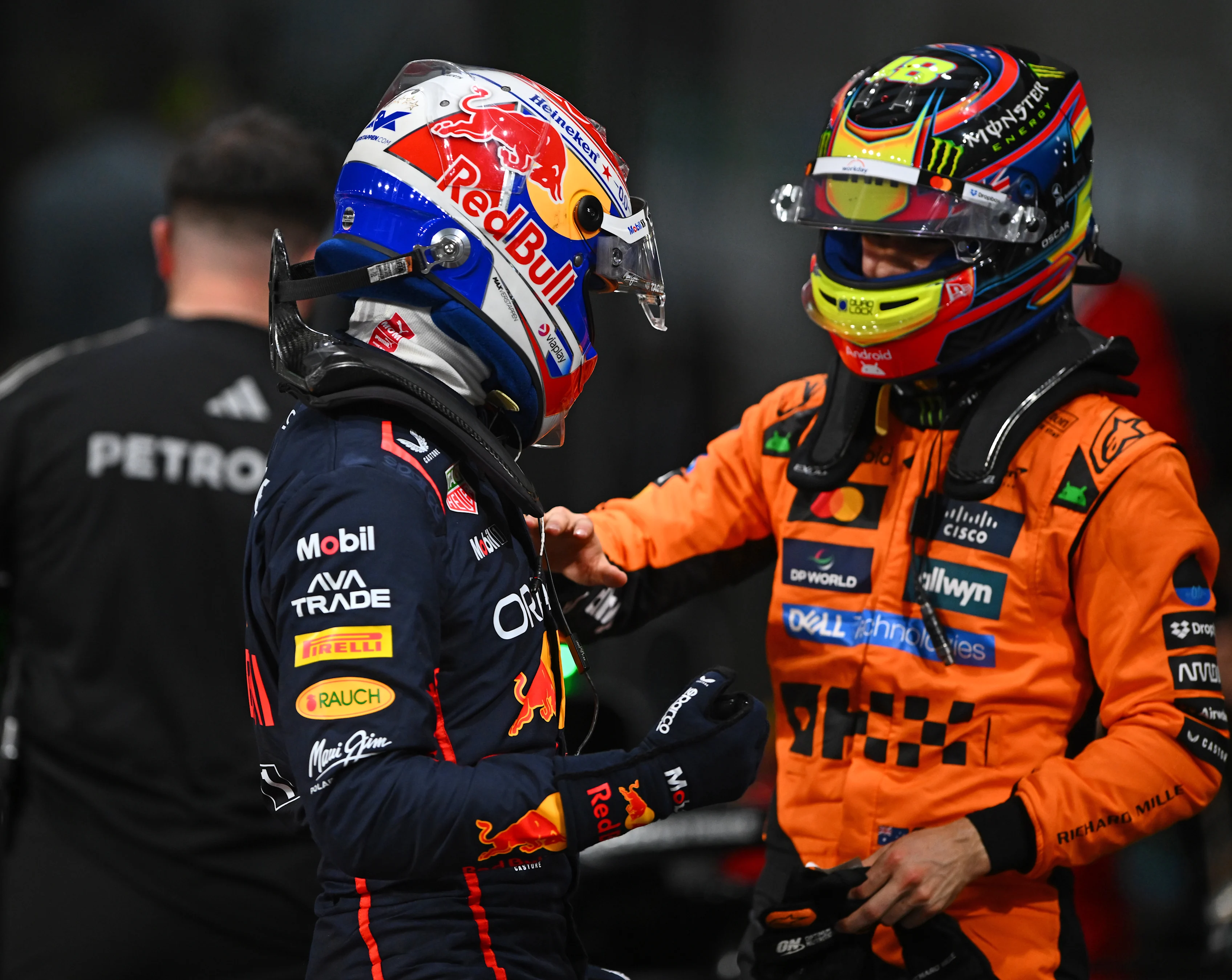 JEDDAH, SAUDI ARABIA - APRIL 19: Pole position qualifier Max Verstappen of the Netherlands and Oracle Red Bull Racing and Second placed qualifier Oscar Piastri of Australia and McLaren celebrate in parc ferme during qualifying ahead of the F1 Grand Prix of Saudi Arabia at Jeddah Corniche Circuit on April 19, 2025 in Jeddah, Saudi Arabia. (Photo by Rudy Carezzevoli/Getty Images)