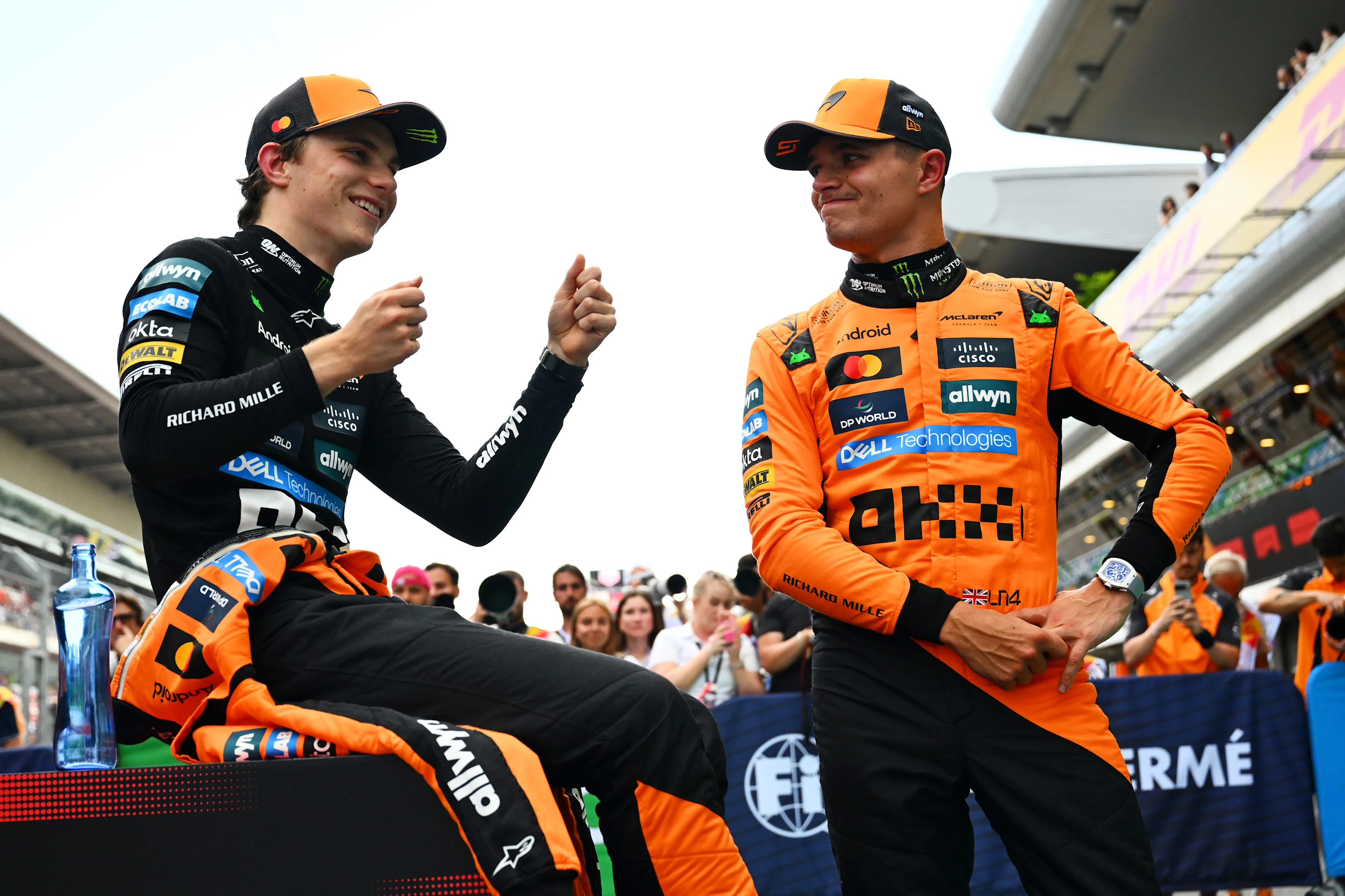 BARCELONA, SPAIN - MAY 31: Pole position qualifier Oscar Piastri of Australia and McLaren and Second placed qualifier Lando Norris of Great Britain and McLaren talk in parc ferme during qualifying ahead of the F1 Grand Prix of Spain at Circuit de Barcelona-Catalunya on May 31, 2025 in Barcelona, Spain. (Photo by Mark Sutton - Formula 1/Formula 1 via Getty Images)